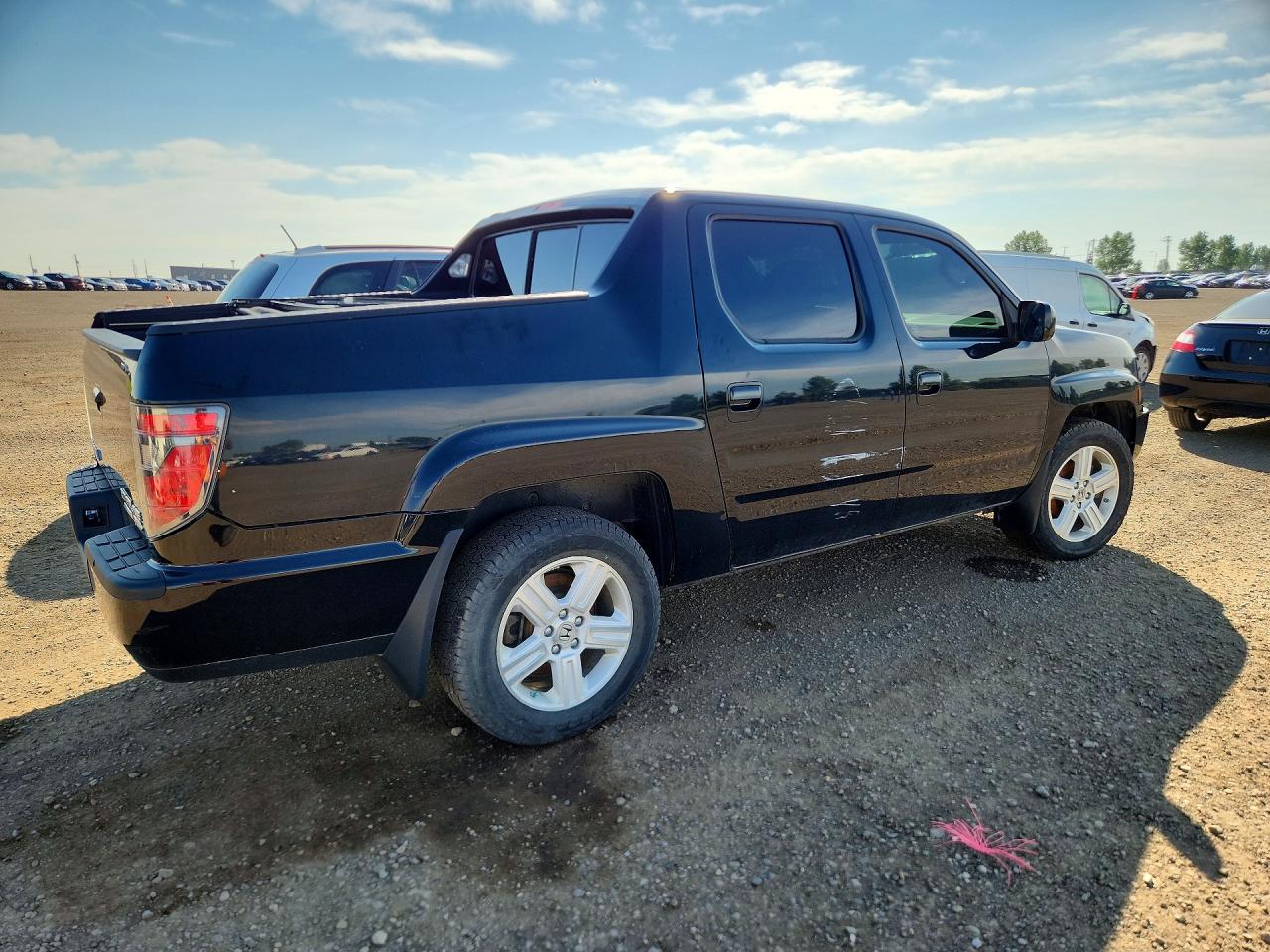 2013 Honda Ridgeline Rtl Black vin: 5FPYK1F57DB502007