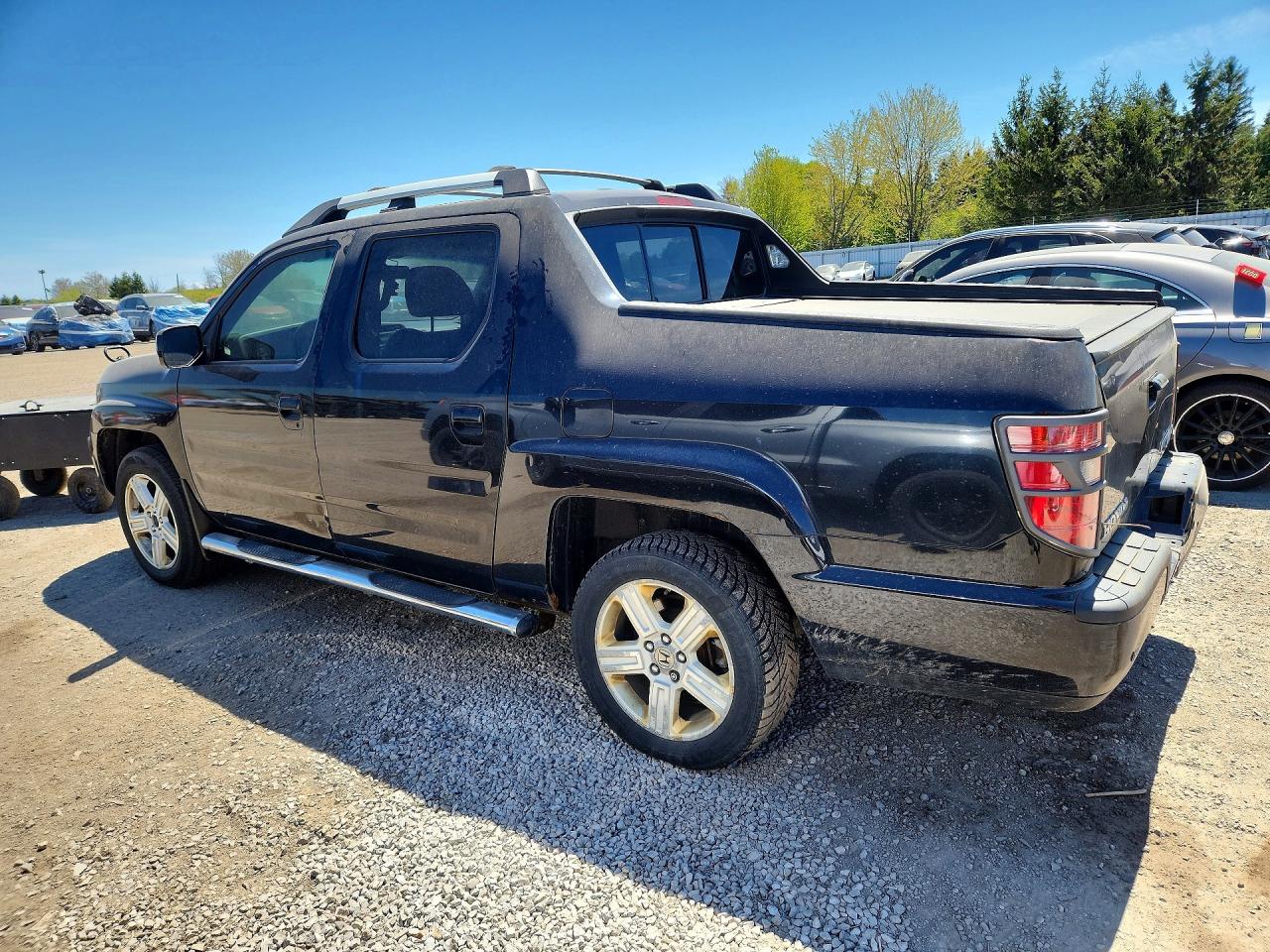 2011 Honda Ridgeline Rtl Black vin: 5FPYK1F58BB502157