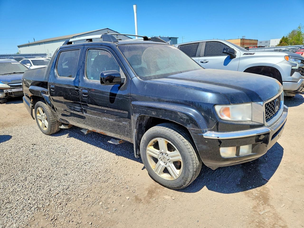 2011 Honda Ridgeline Rtl Black vin: 5FPYK1F58BB502157