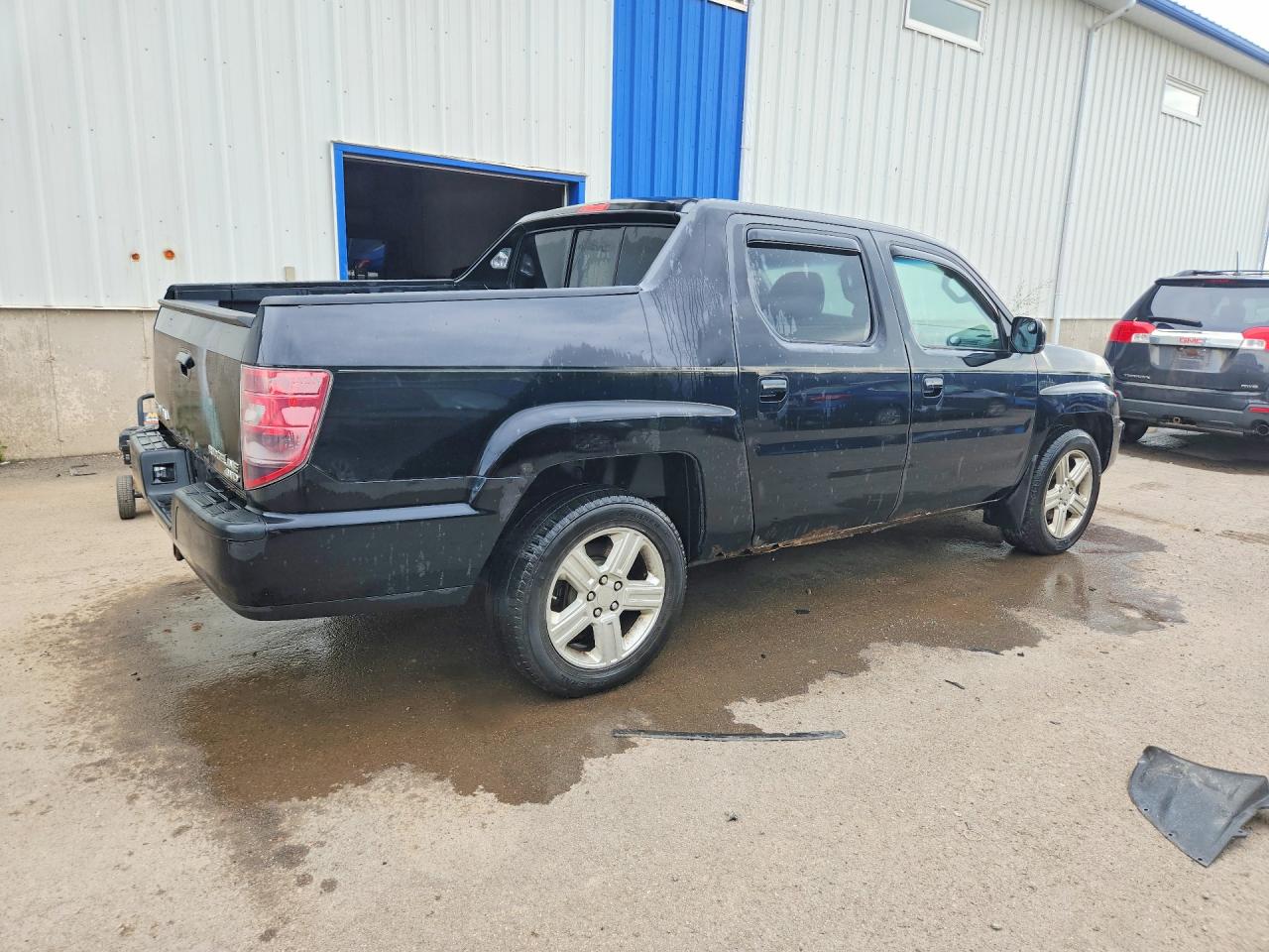 2010 Honda Ridgeline Rtl Black vin: 5FPYK1F59AB001471