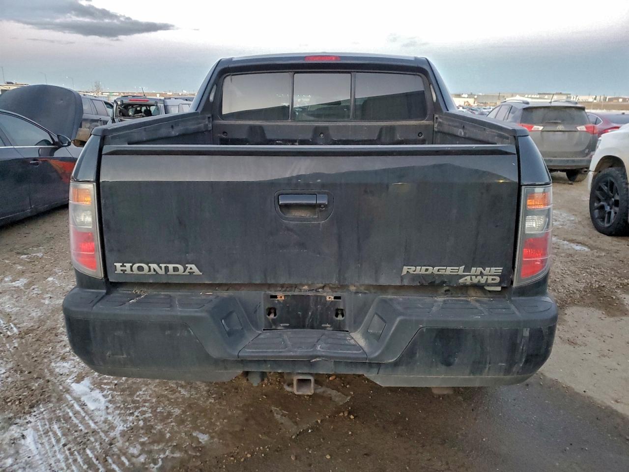 2010 Honda Ridgeline Rtl Black vin: 5FPYK1F59AB504028