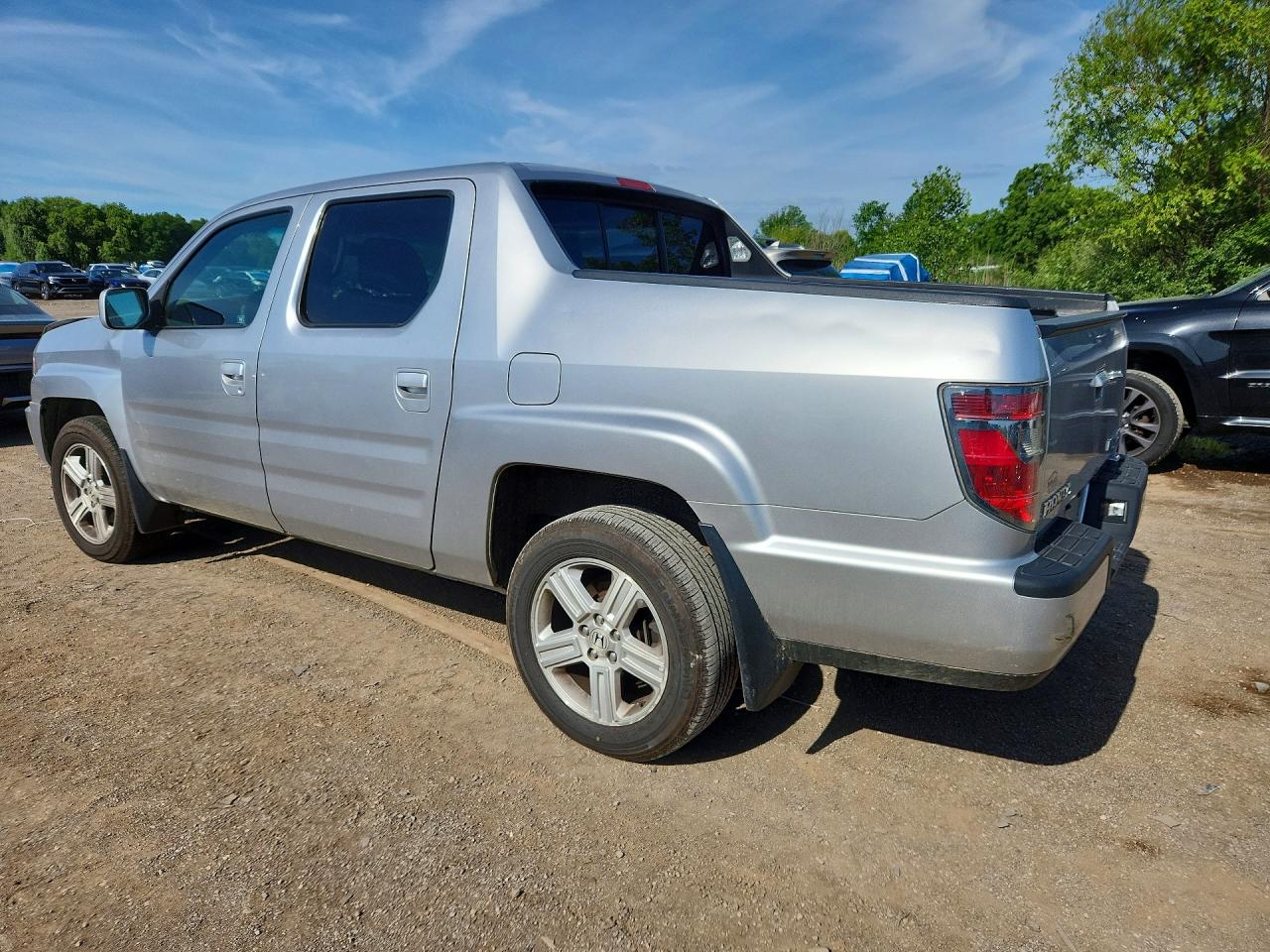 2012 Honda Ridgeline Rtl Silver vin: 5FPYK1F59CB459482