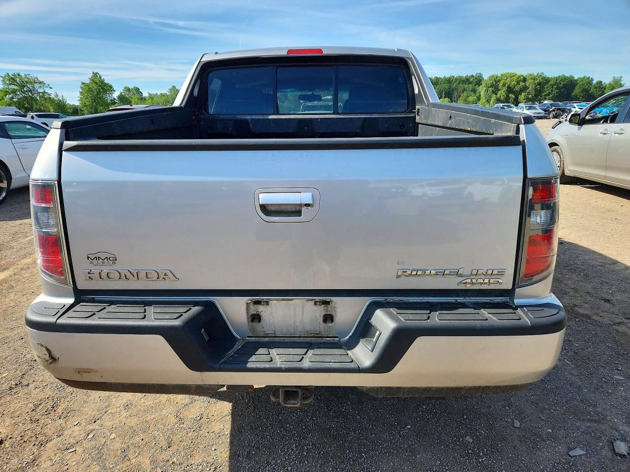 2012 Honda Ridgeline Rtl Silver vin: 5FPYK1F59CB459482