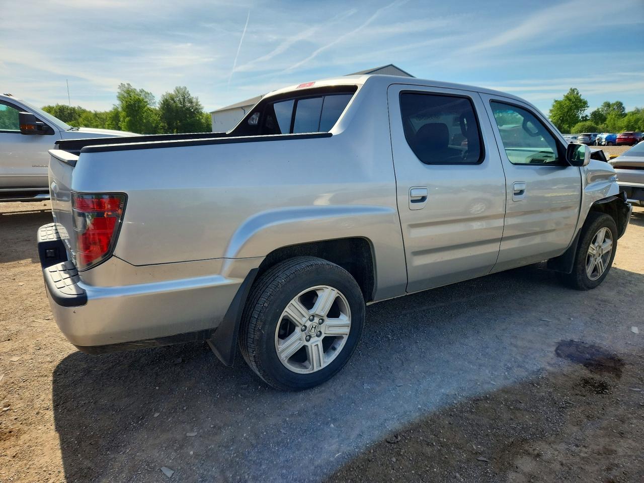 2012 Honda Ridgeline Rtl Silver vin: 5FPYK1F59CB459482