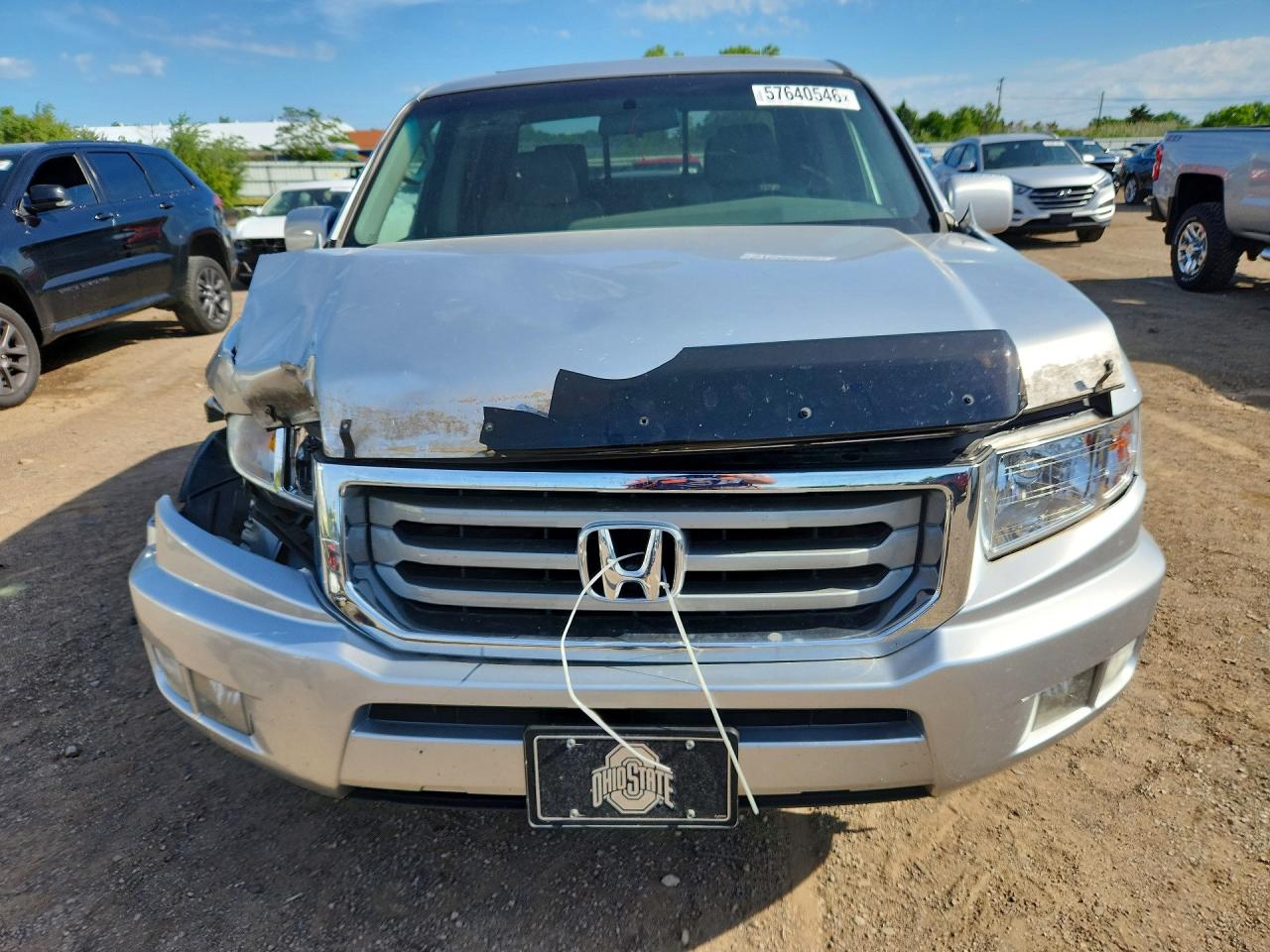 2012 Honda Ridgeline Rtl Silver vin: 5FPYK1F59CB459482