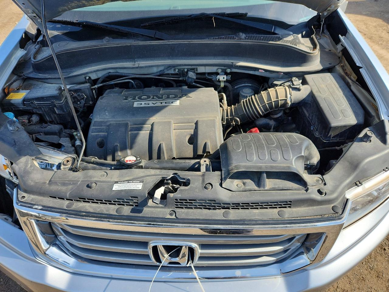 2012 Honda Ridgeline Rtl Silver vin: 5FPYK1F59CB459482