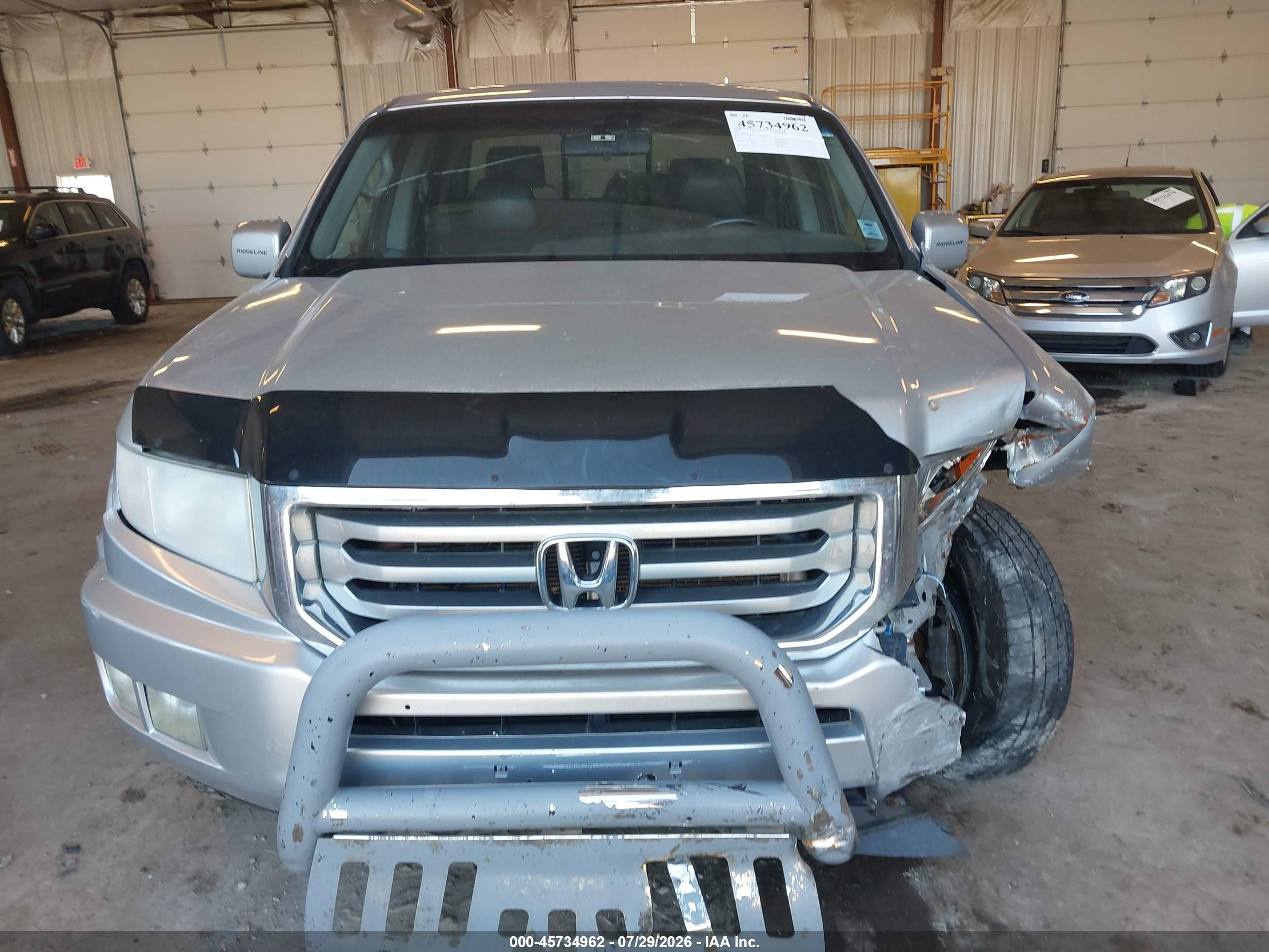 2012 Honda Ridgeline Rtl Серебряный vin: 5FPYK1F59CB551711