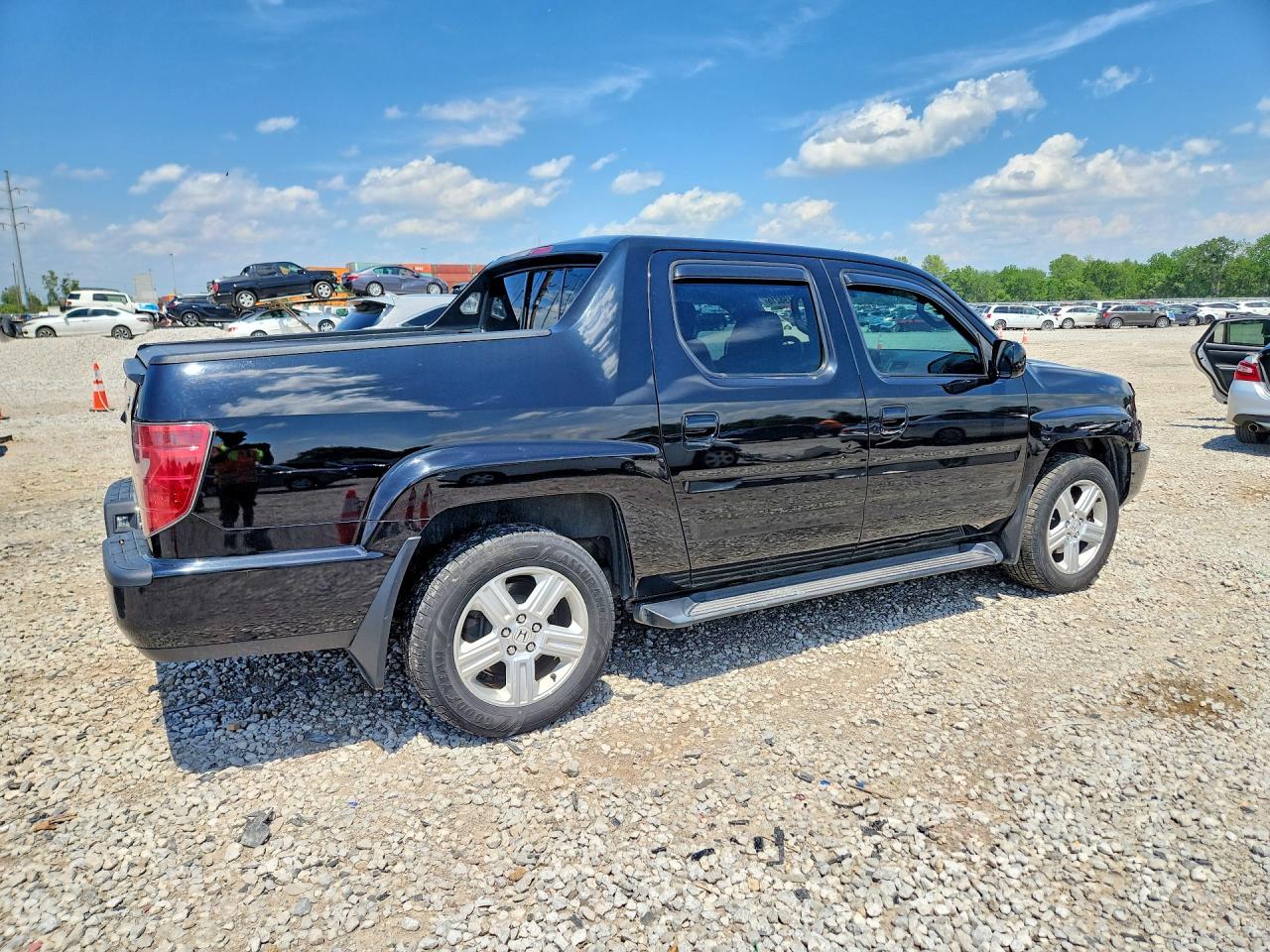 2011 Honda Ridgeline Rtl Black vin: 5FPYK1F5XBB001982
