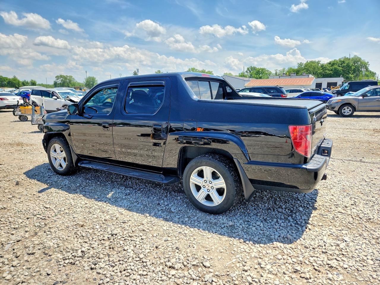 2011 Honda Ridgeline Rtl Black vin: 5FPYK1F5XBB001982