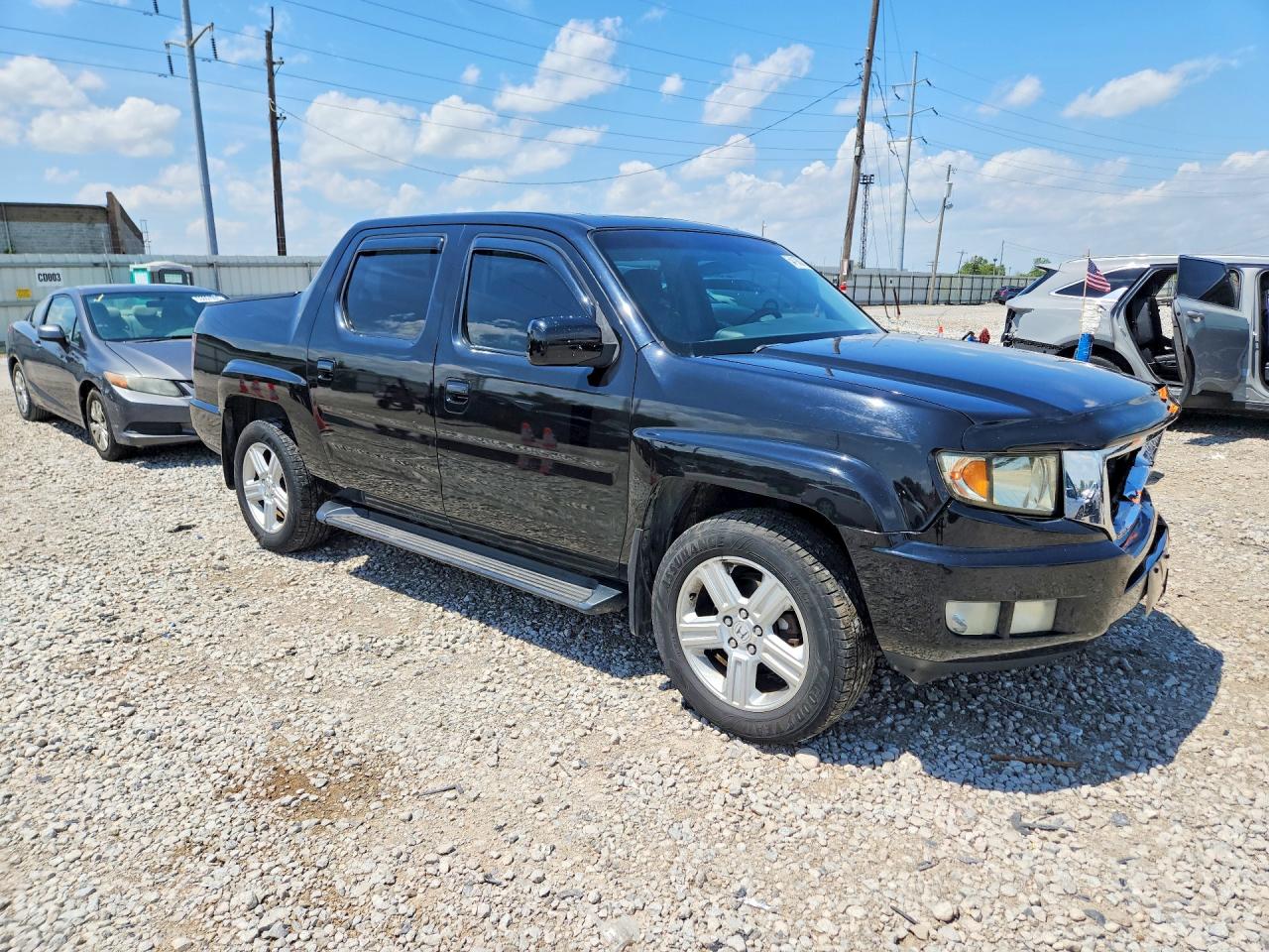 2011 Honda Ridgeline Rtl Black vin: 5FPYK1F5XBB001982