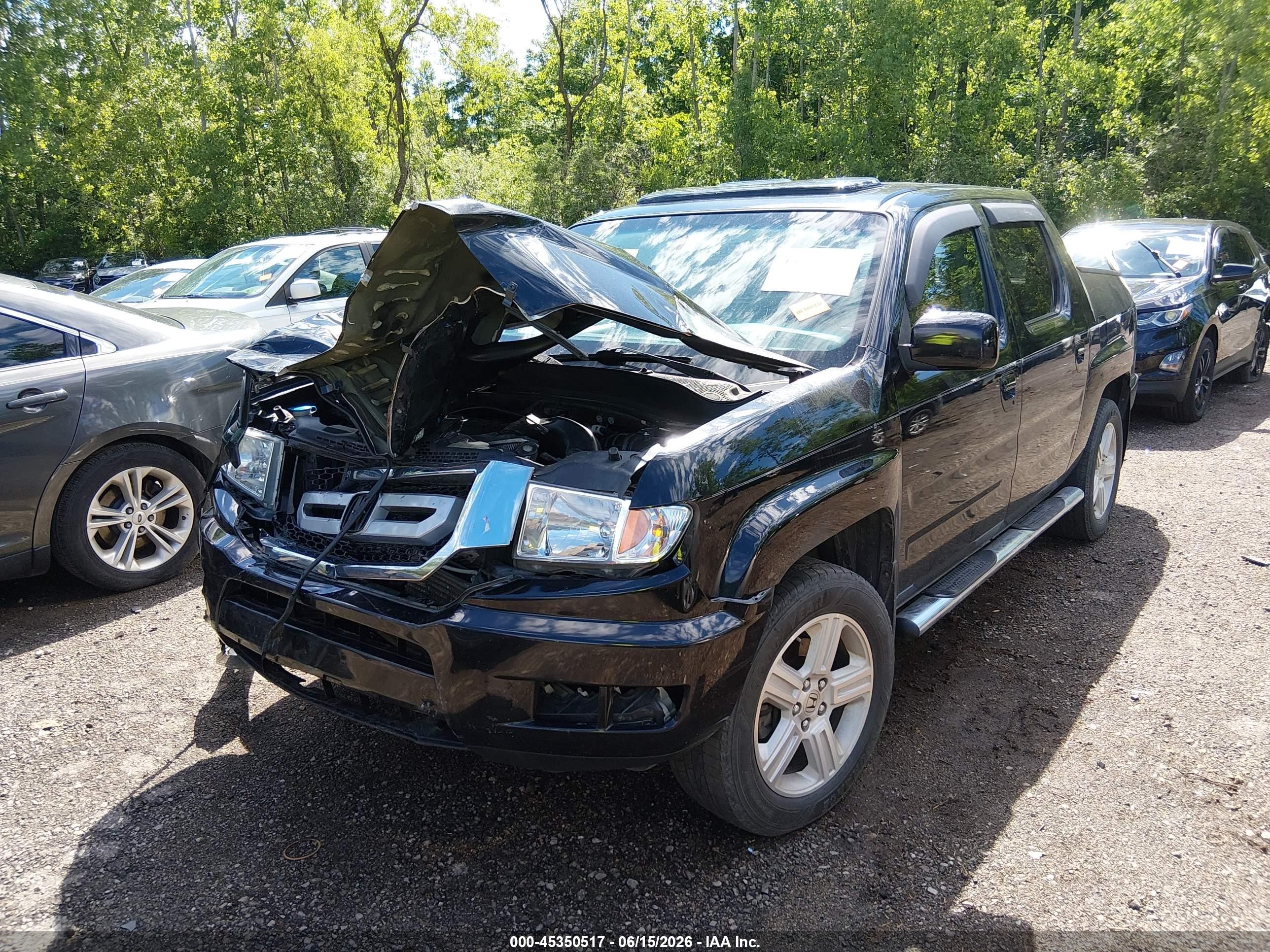2011 Honda Ridgeline Rtl Black vin: 5FPYK1F5XBB453138