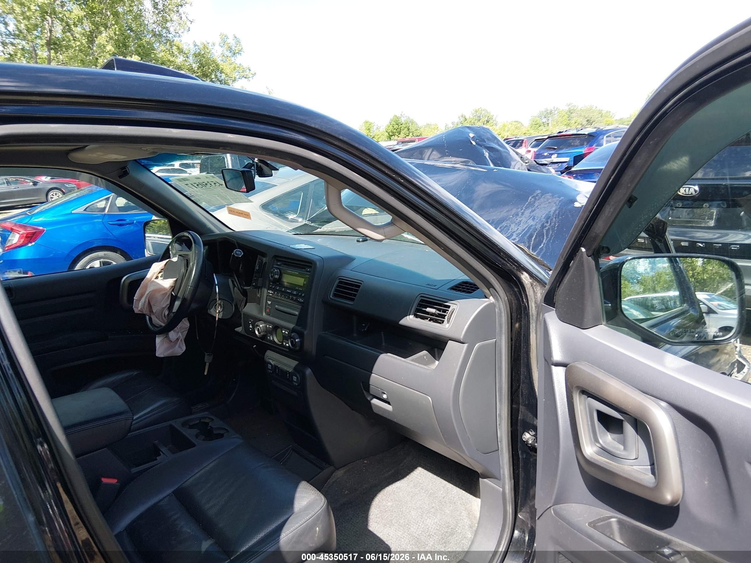 2011 Honda Ridgeline Rtl Black vin: 5FPYK1F5XBB453138
