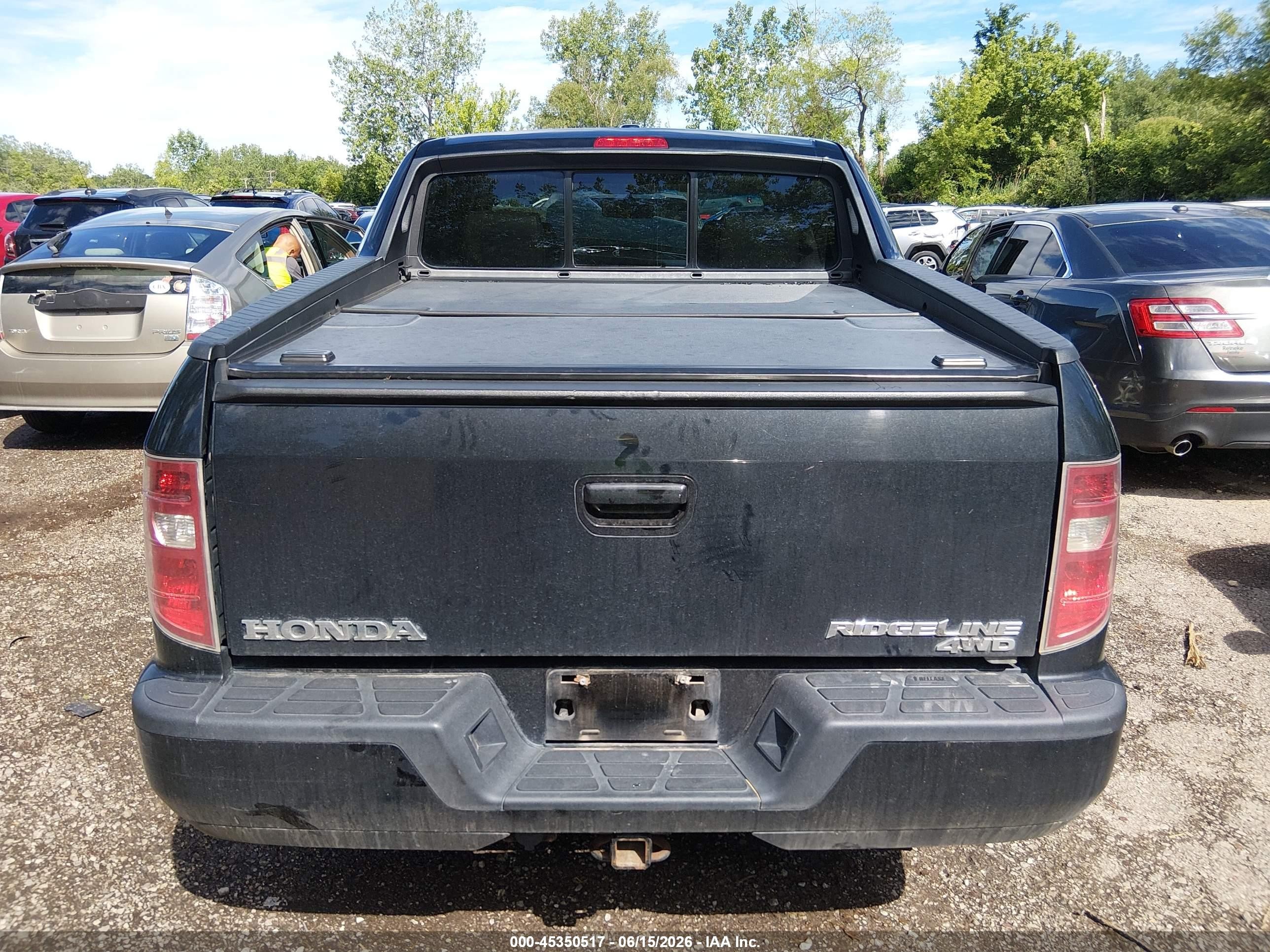 2011 Honda Ridgeline Rtl Black vin: 5FPYK1F5XBB453138