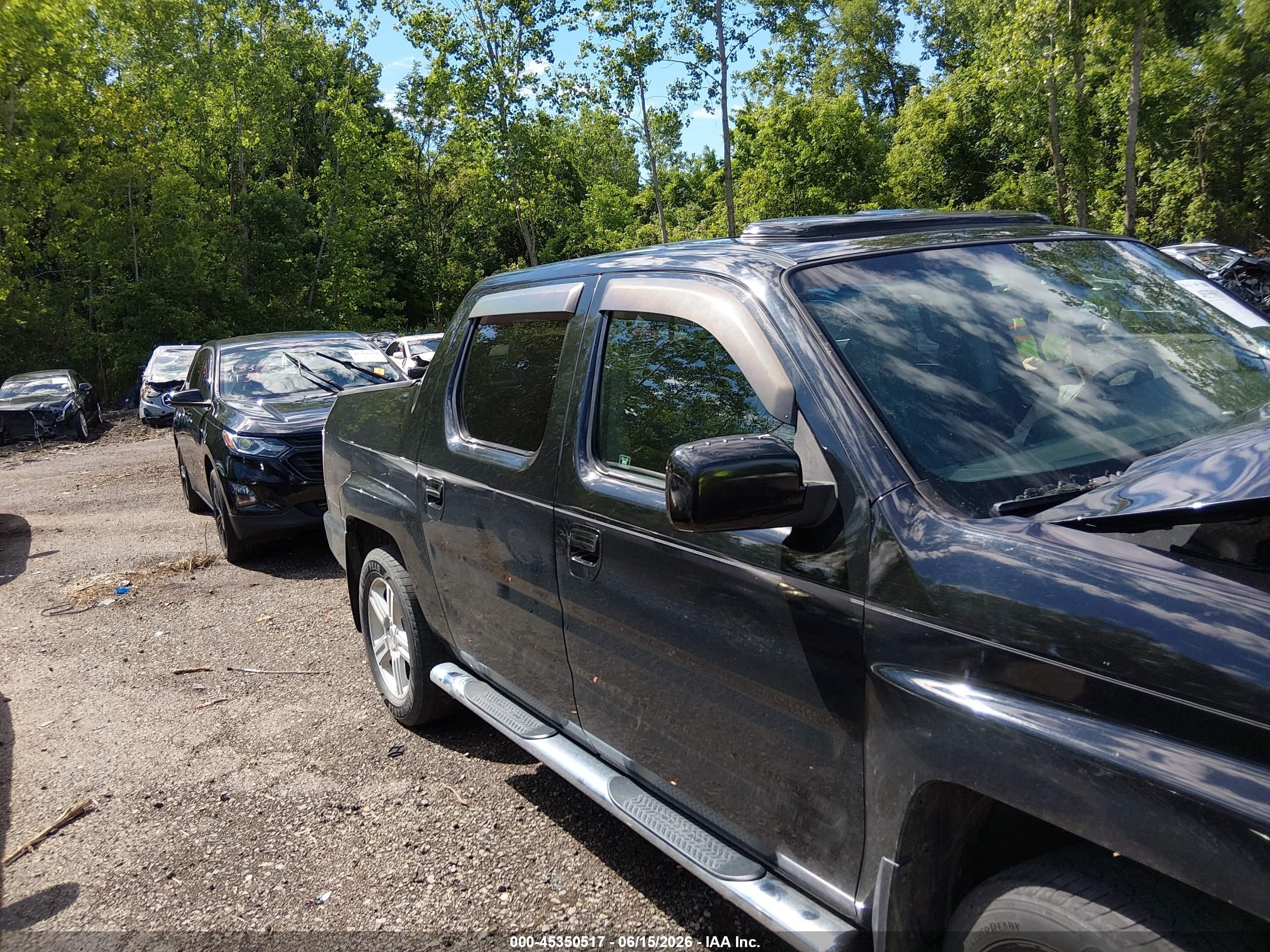 2011 Honda Ridgeline Rtl Black vin: 5FPYK1F5XBB453138