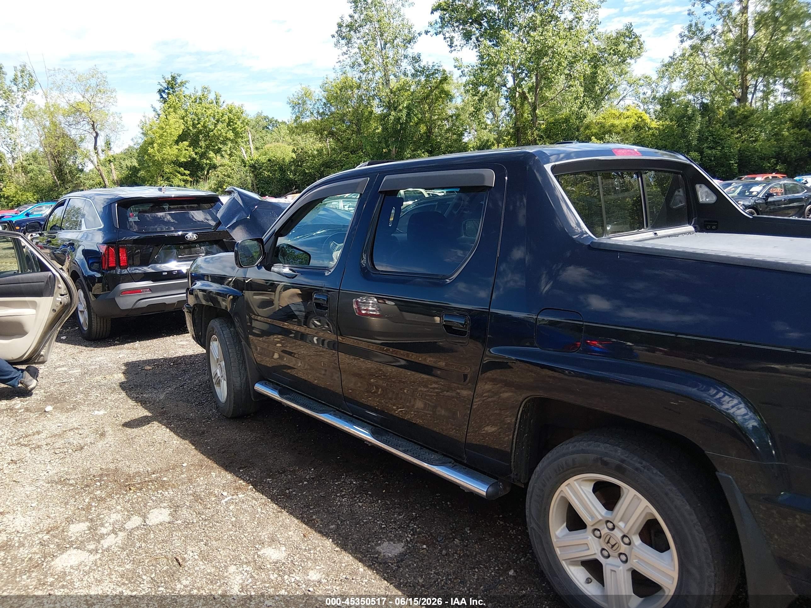 2011 Honda Ridgeline Rtl Black vin: 5FPYK1F5XBB453138
