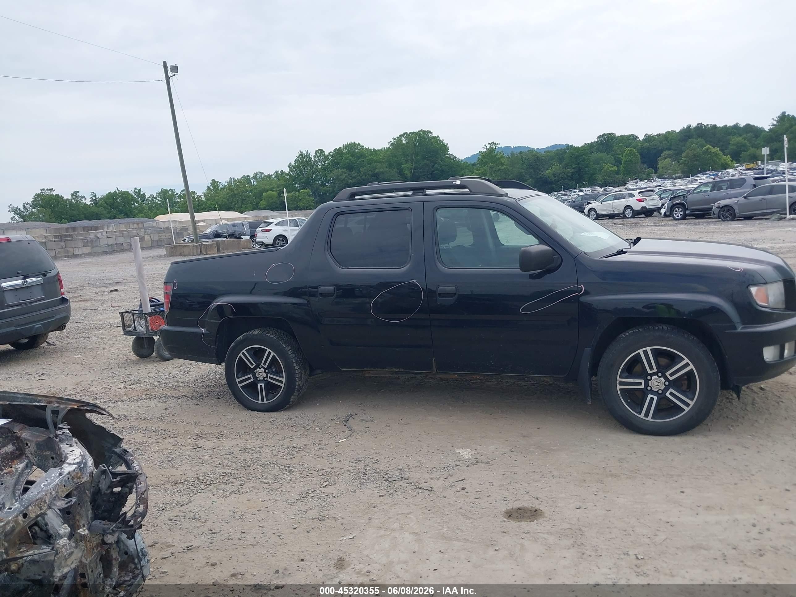 2014 Honda Ridgeline Sport Black vin: 5FPYK1F70EB001429