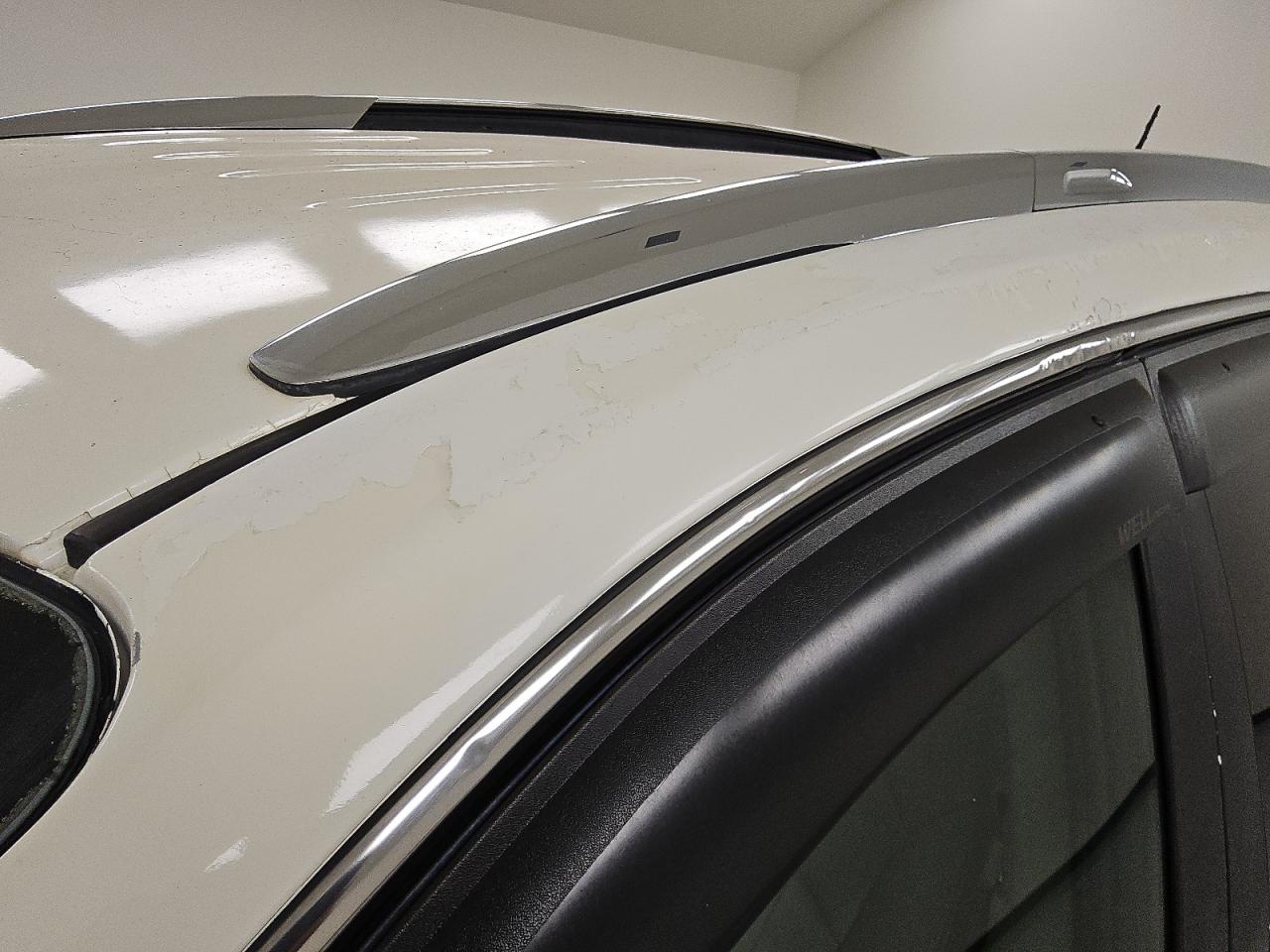 2012 Buick Enclave White vin: 5GAKVDED0CJ354520 Damage: Left Drip Rail, Peeling, > 12 Inches