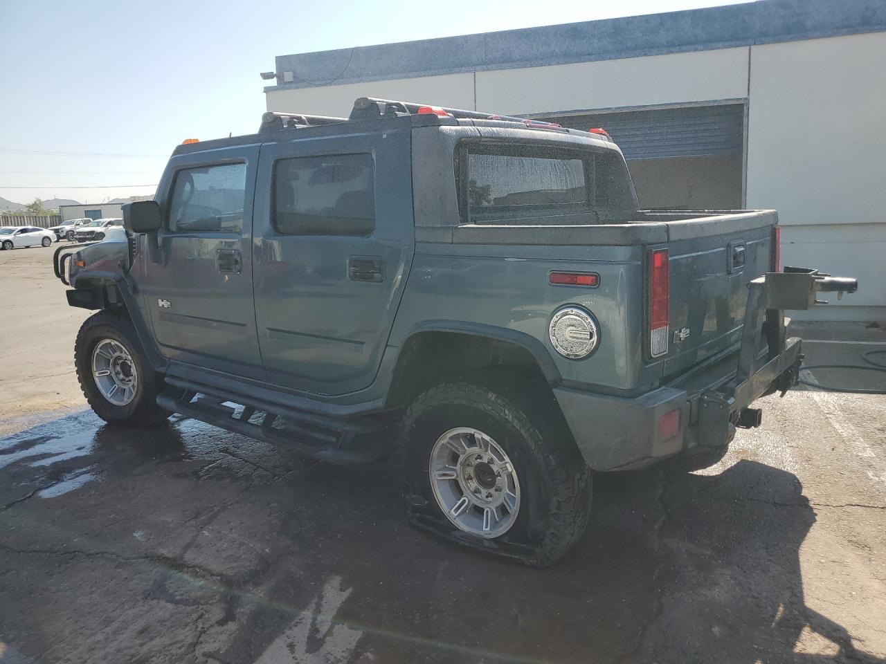 2006 Hummer H2 Sut Blue vin: 5GRGN22UX6H113510 Damage: Left Rear Door, Heavy Scratch, 1 To 2 Inches