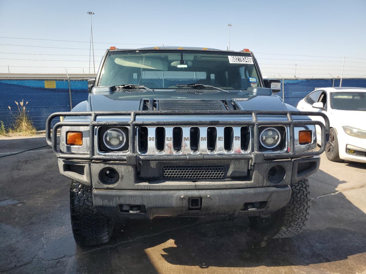 2006 Hummer H2 Sut Blue vin: 5GRGN22UX6H113510 Damage: Left Fog Lamp, Missing, Replacement Required
