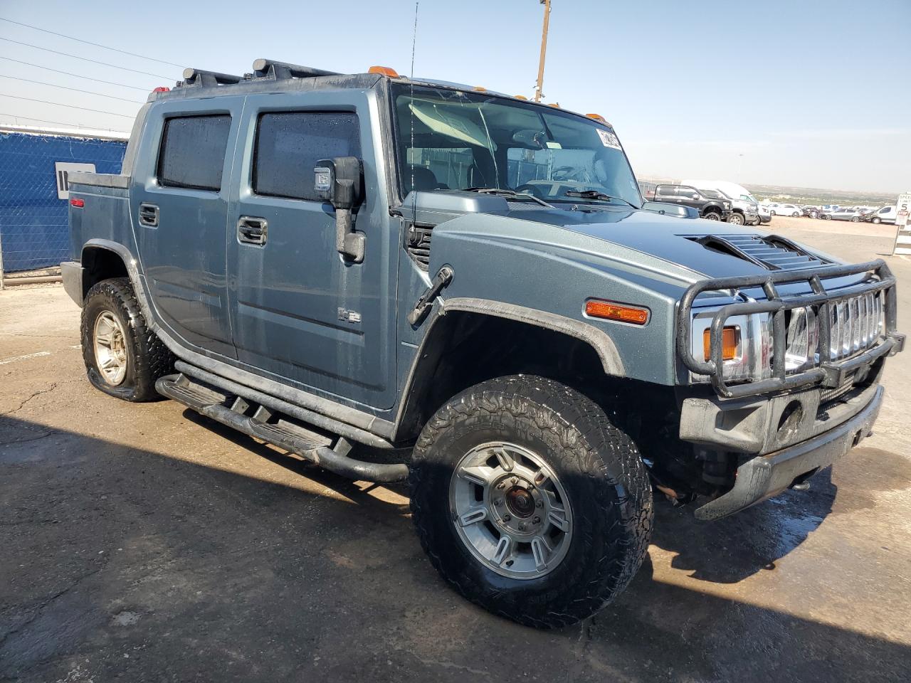 2006 Hummer H2 Sut Blue vin: 5GRGN22UX6H113510 Damage: Right Front Door, Dent(S) W/ Paint Dmg, 2 To 3 Inches