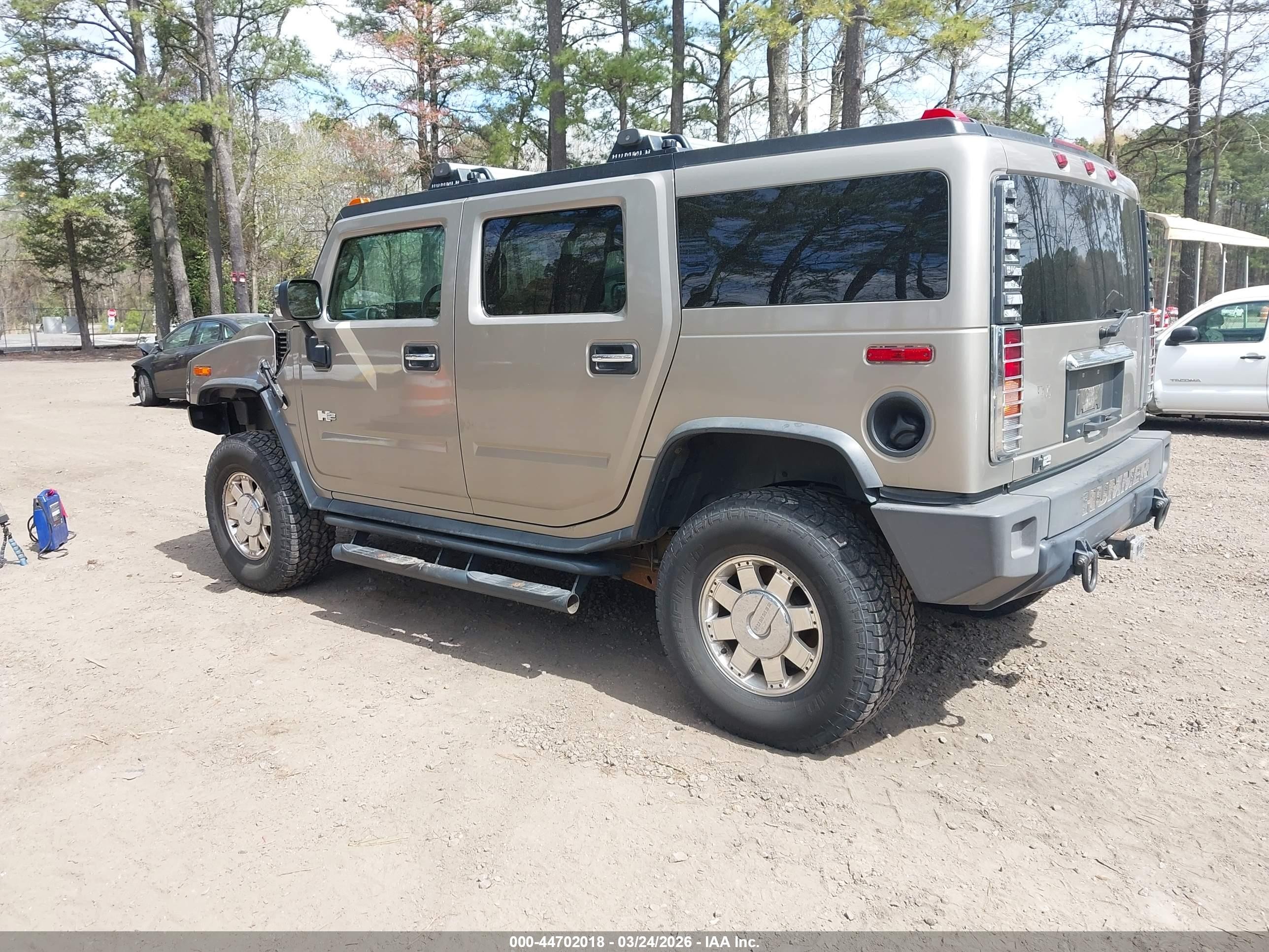 2003 Hummer H2   Tan vin: 5GRGN23U03H126129