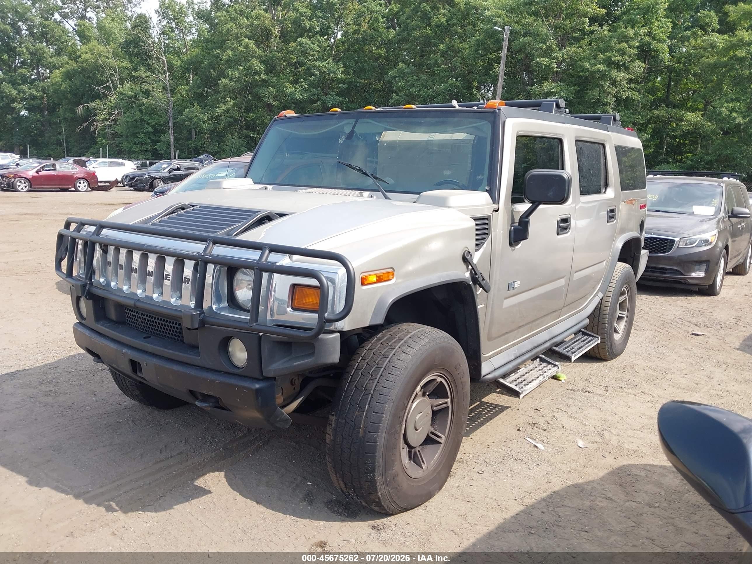 2004 Hummer H2   Gold vin: 5GRGN23U04H101796