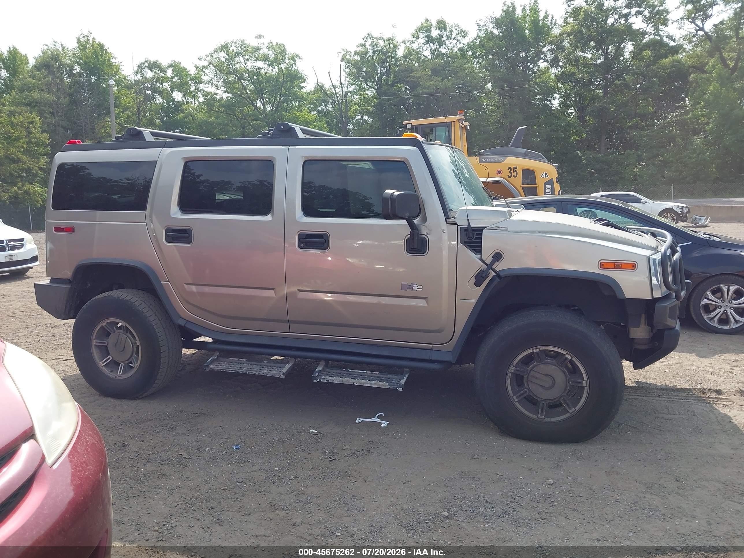 2004 Hummer H2   Gold vin: 5GRGN23U04H101796