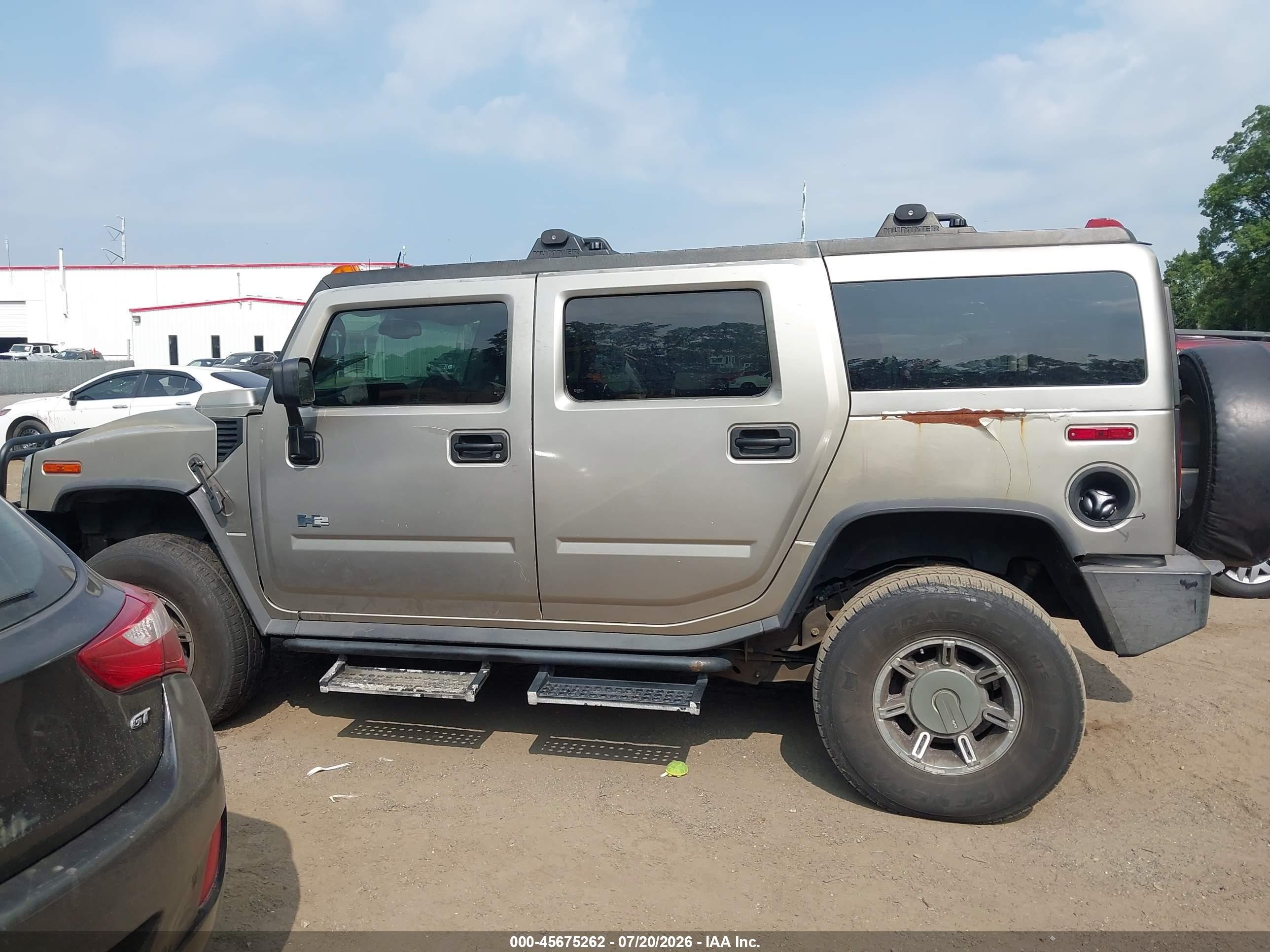 2004 Hummer H2   Gold vin: 5GRGN23U04H101796