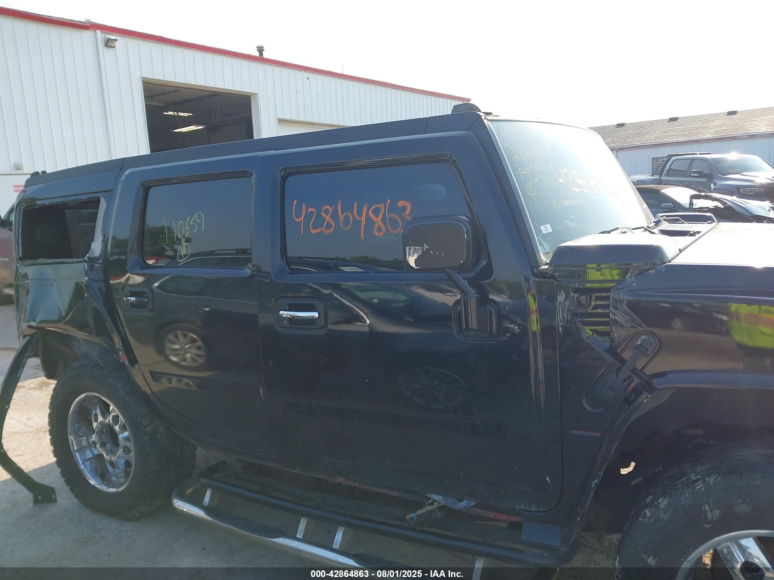 2005 Hummer H2 Suv   Black vin: 5GRGN23U05H110659
