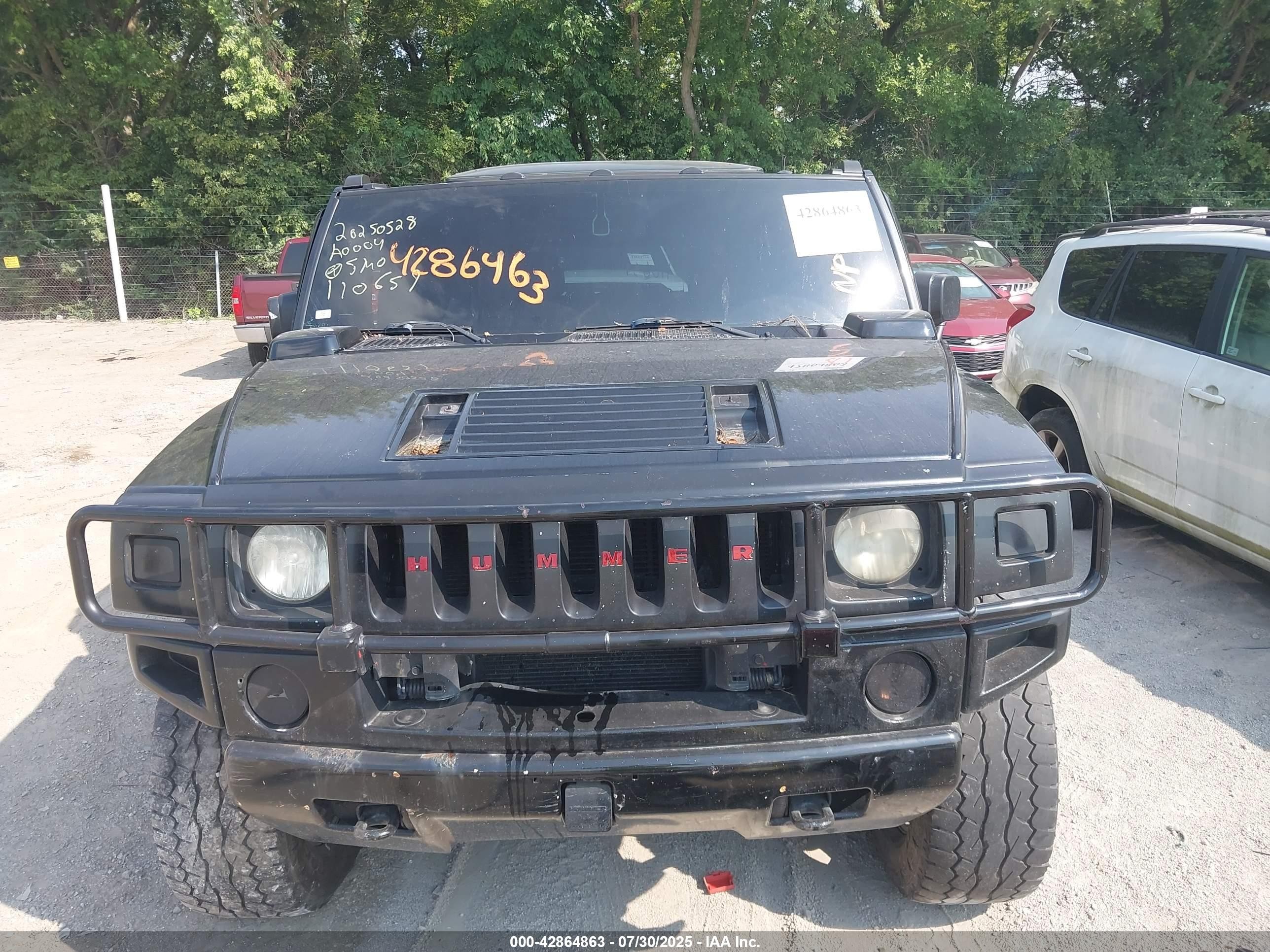 2005 Hummer H2 Suv   Black vin: 5GRGN23U05H110659