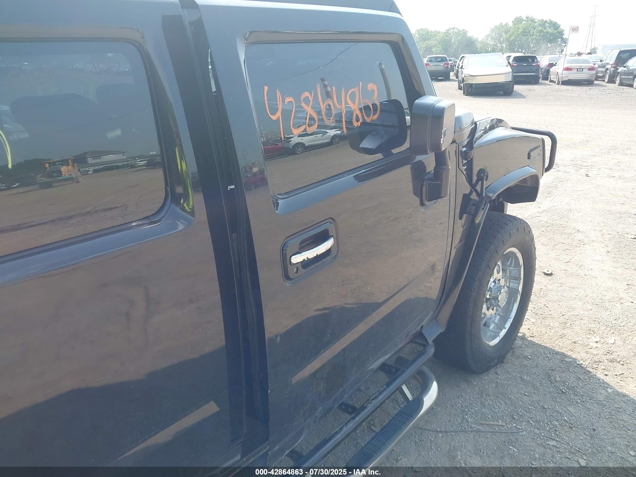 2005 Hummer H2 Suv   Black vin: 5GRGN23U05H110659