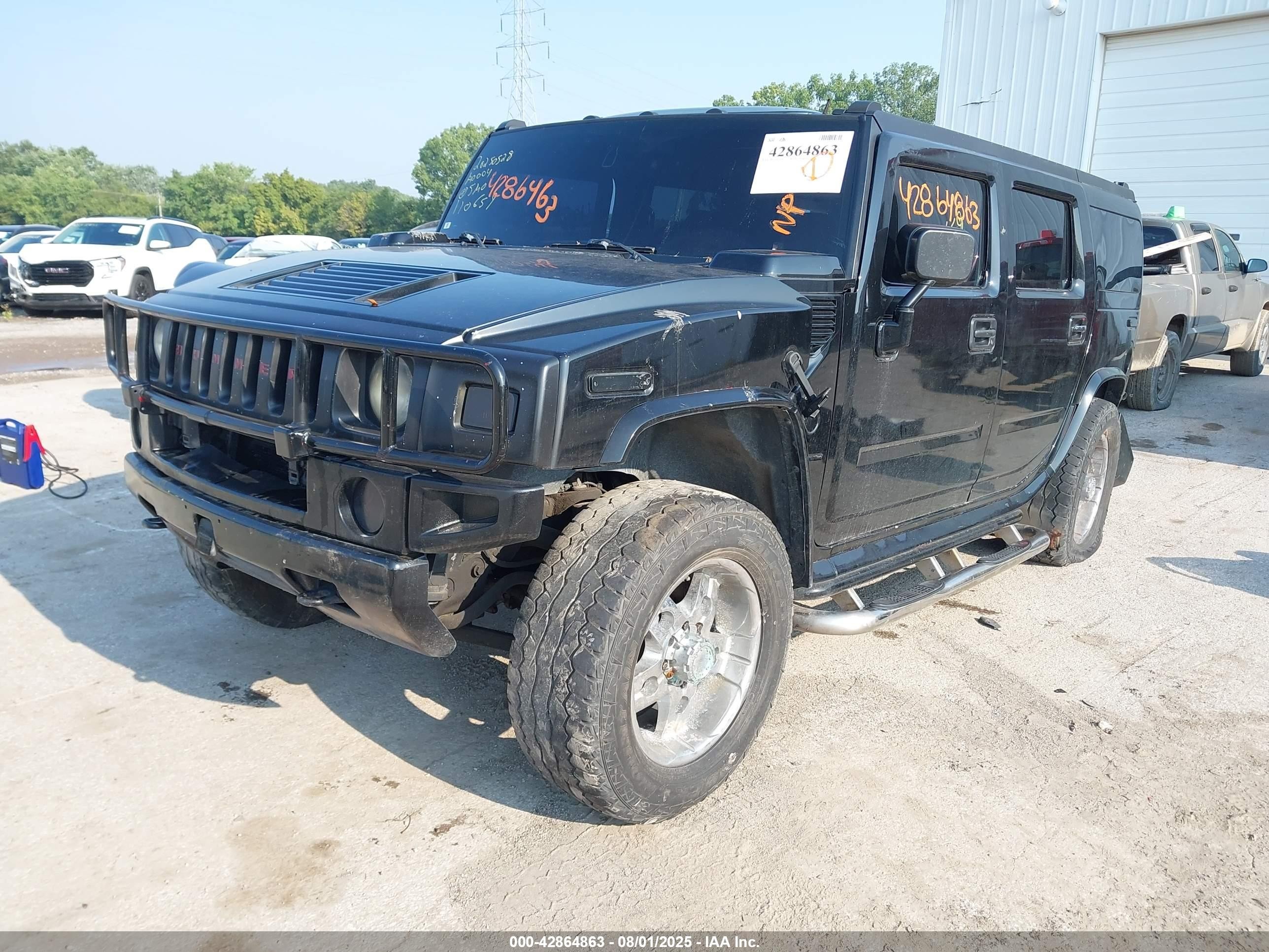 2005 Hummer H2 Suv   Black vin: 5GRGN23U05H110659
