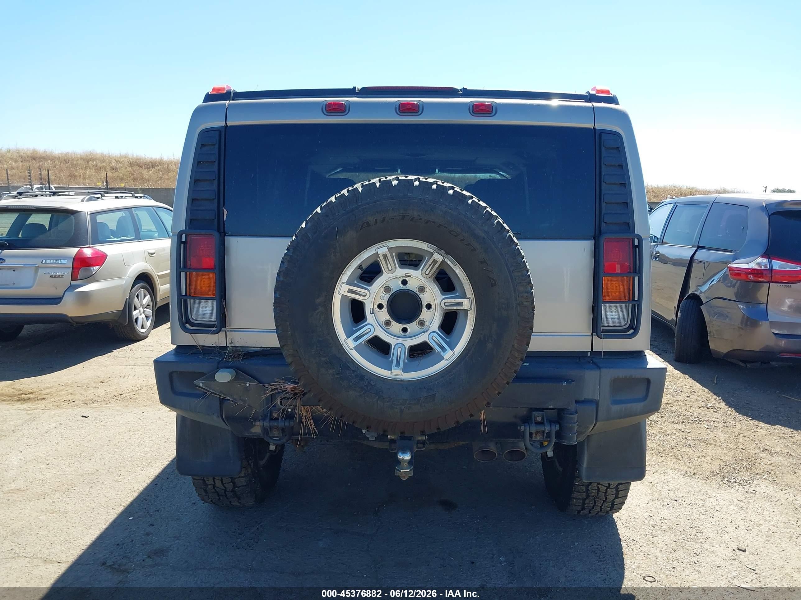 2003 Hummer H2   Tan vin: 5GRGN23U83H103567
