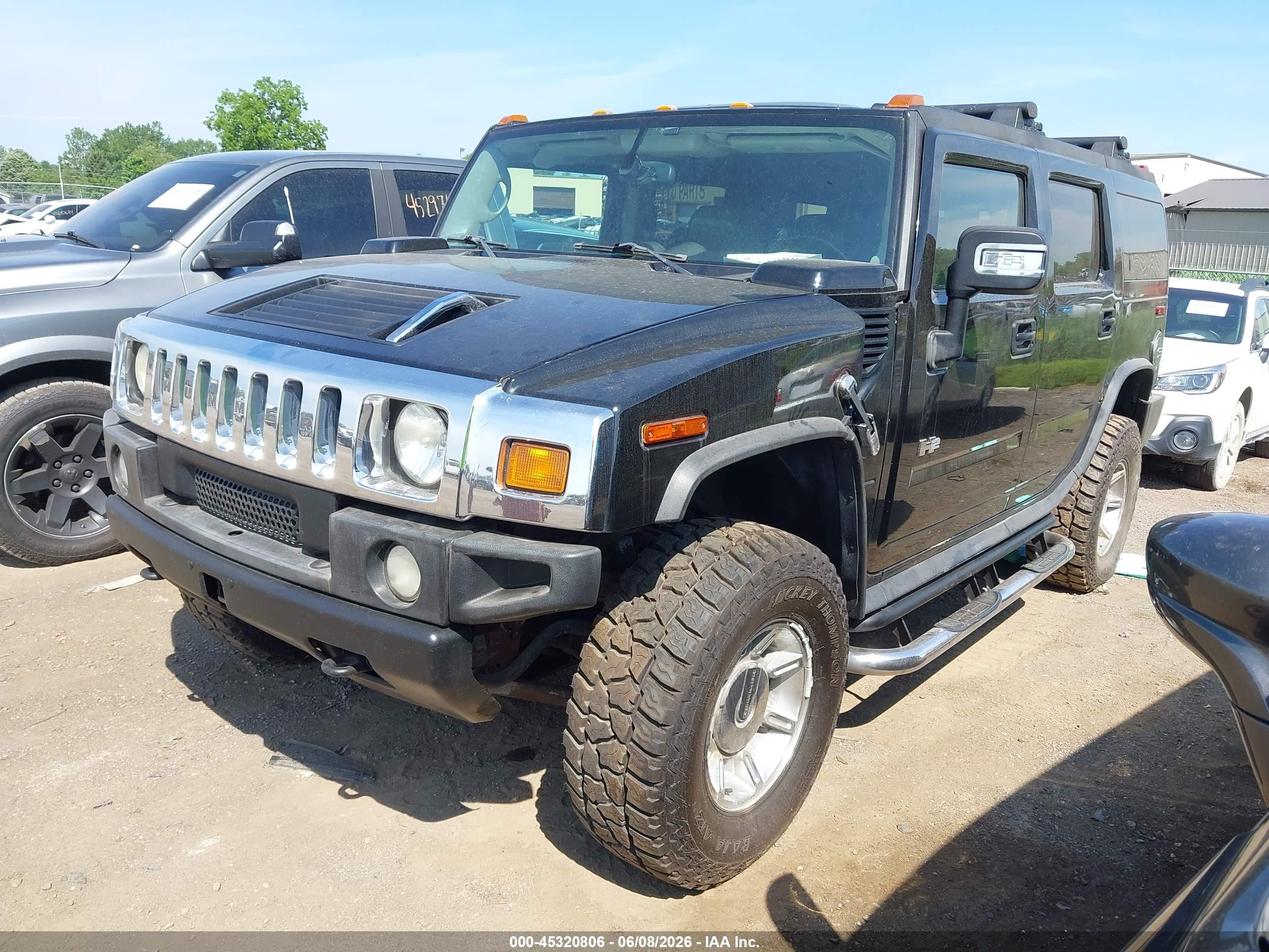 2004 Hummer H2   Черный vin: 5GRGN23U84H112495