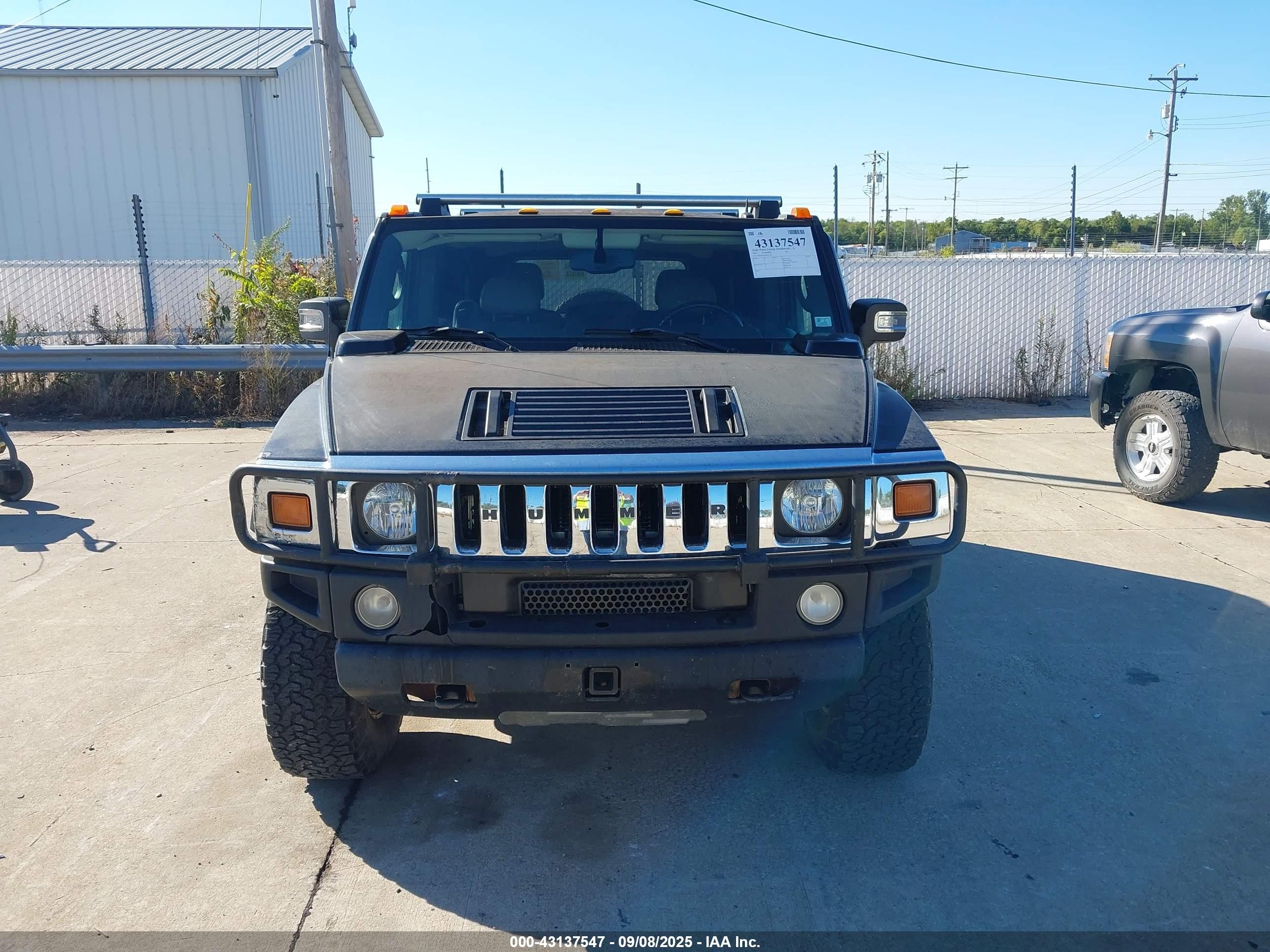 2005 Hummer H2 Suv   Black vin: 5GRGN23U85H121425