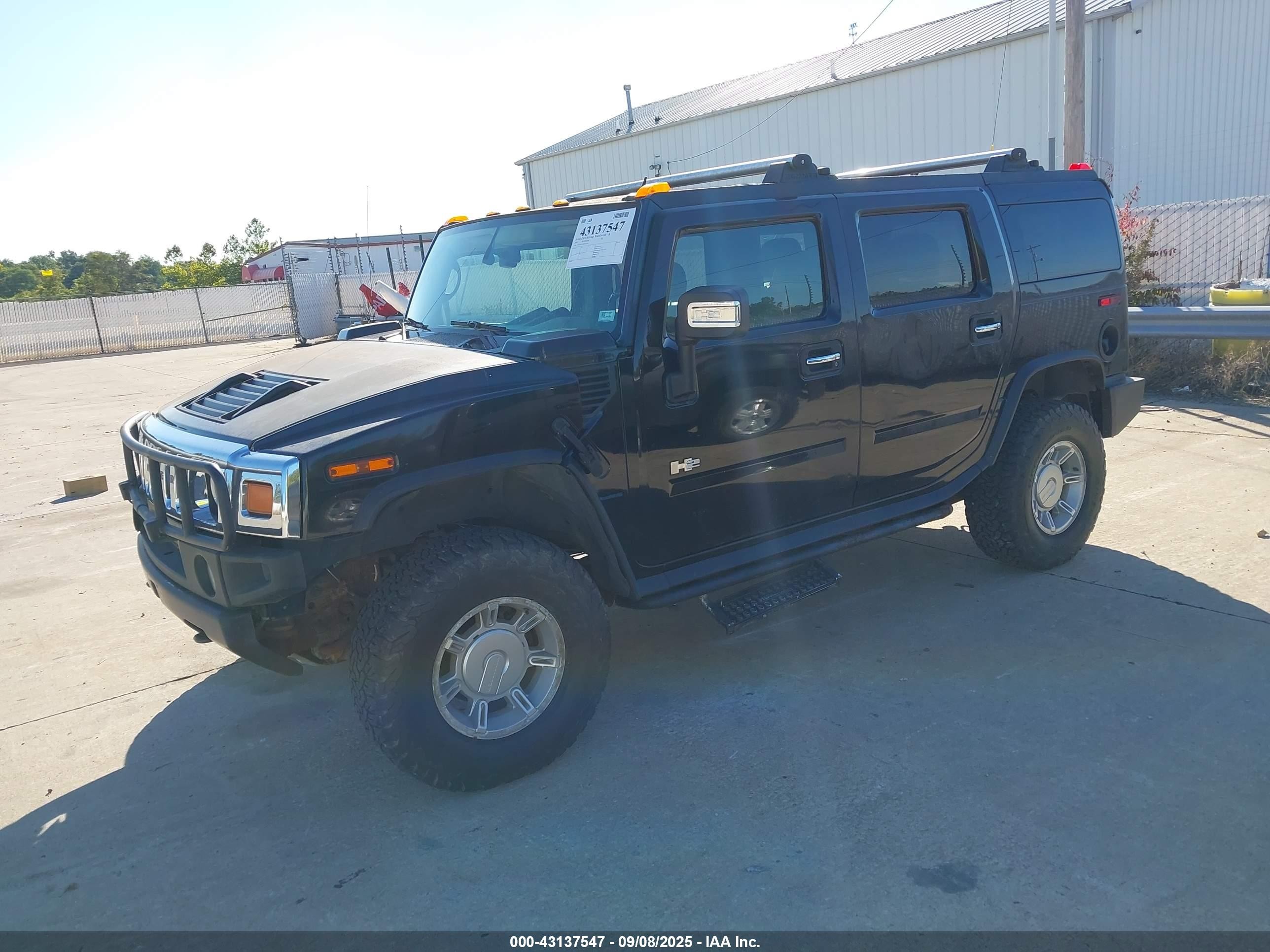 2005 Hummer H2 Suv   Black vin: 5GRGN23U85H121425