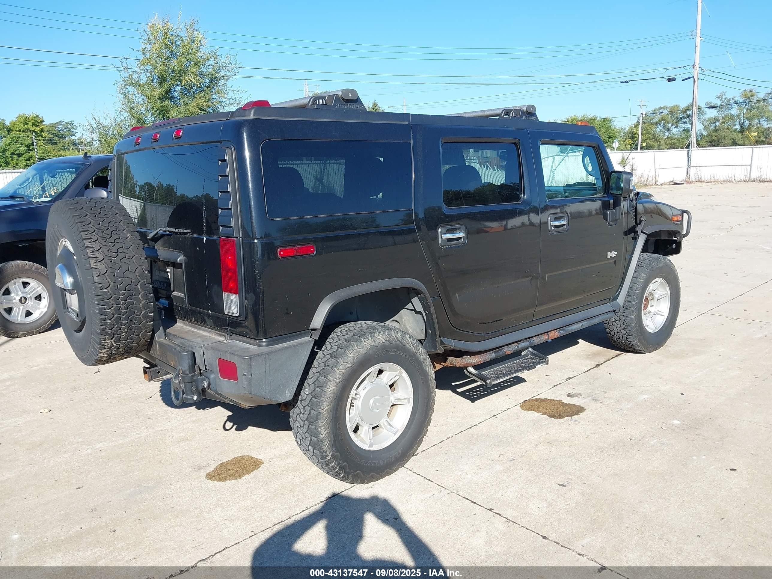 2005 Hummer H2 Suv   Black vin: 5GRGN23U85H121425