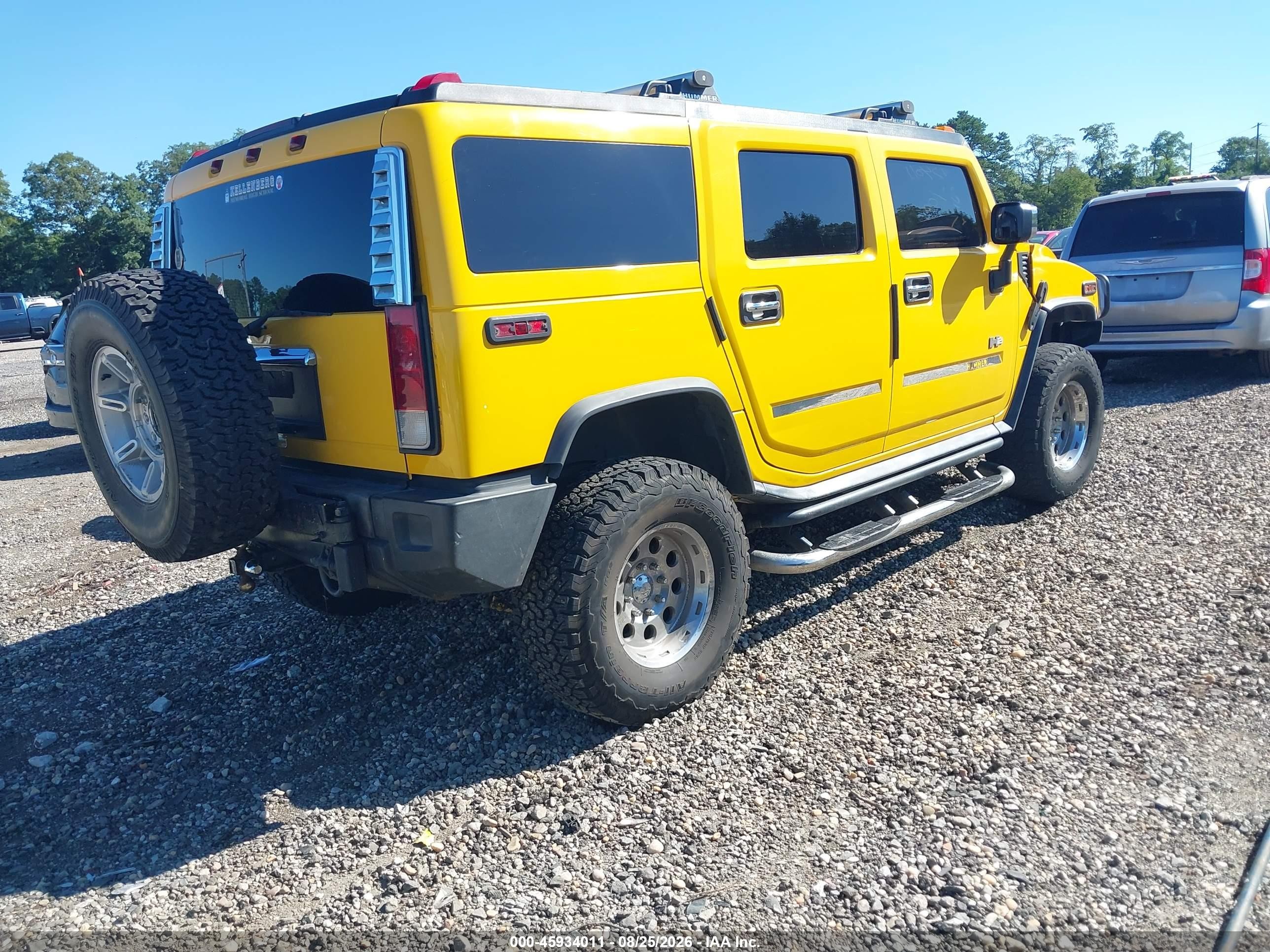 2003 Hummer H2   Yellow vin: 5GRGN23UX3H112187
