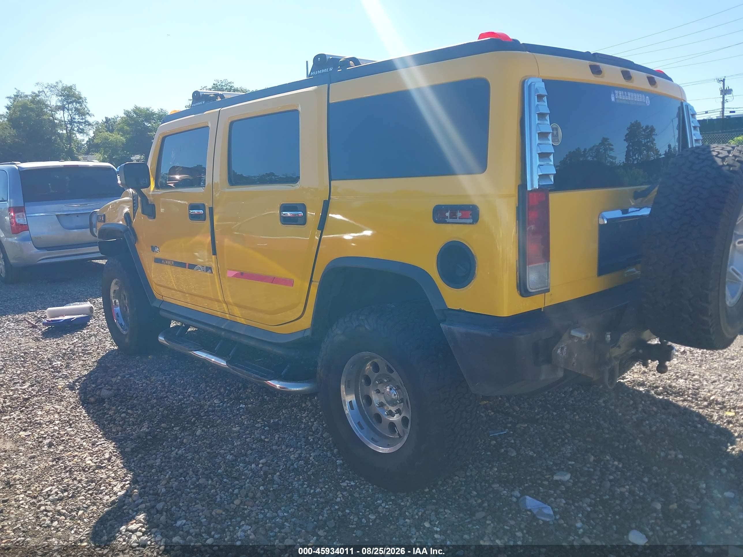 2003 Hummer H2   Yellow vin: 5GRGN23UX3H112187
