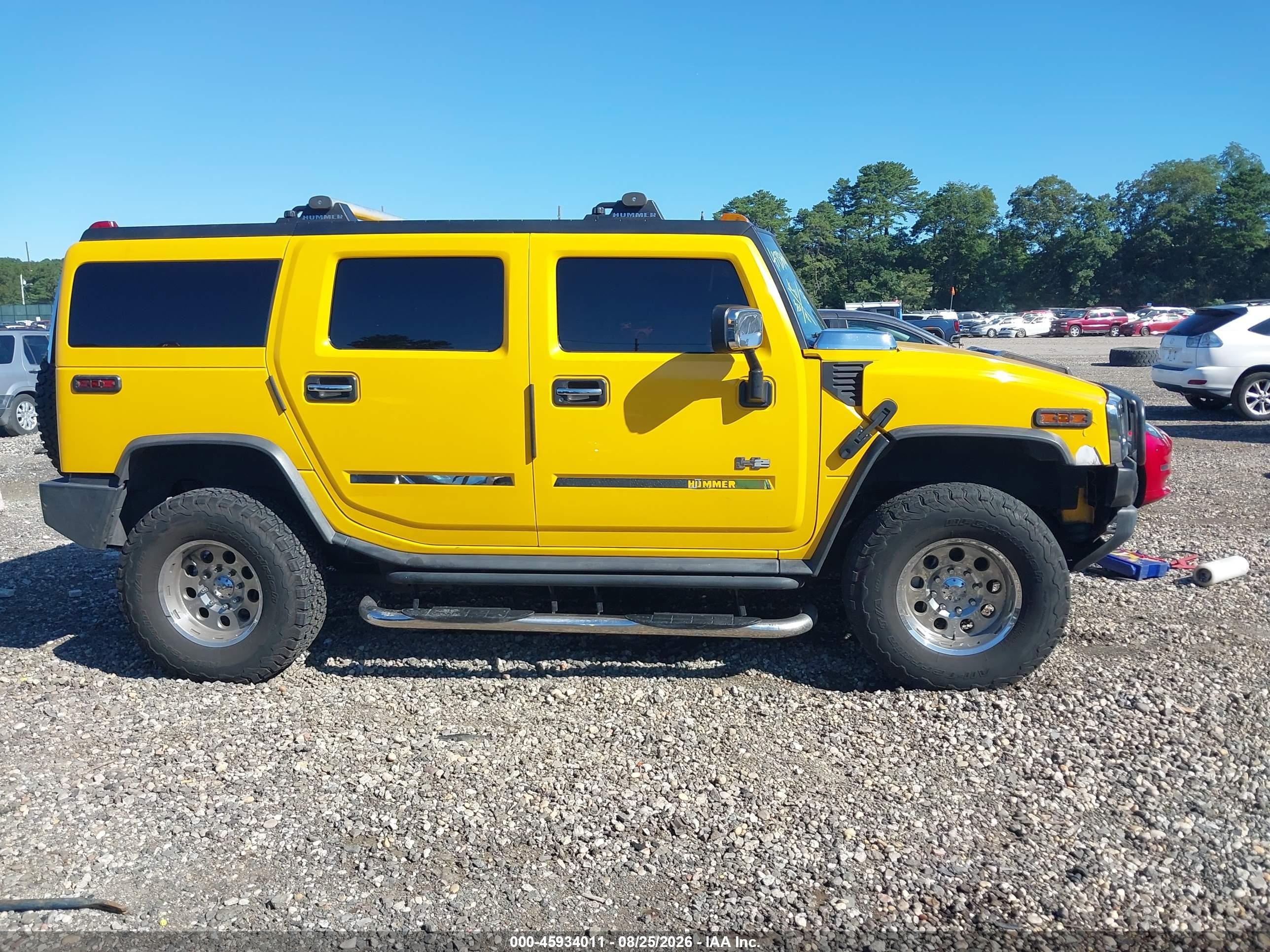 2003 Hummer H2   Yellow vin: 5GRGN23UX3H112187