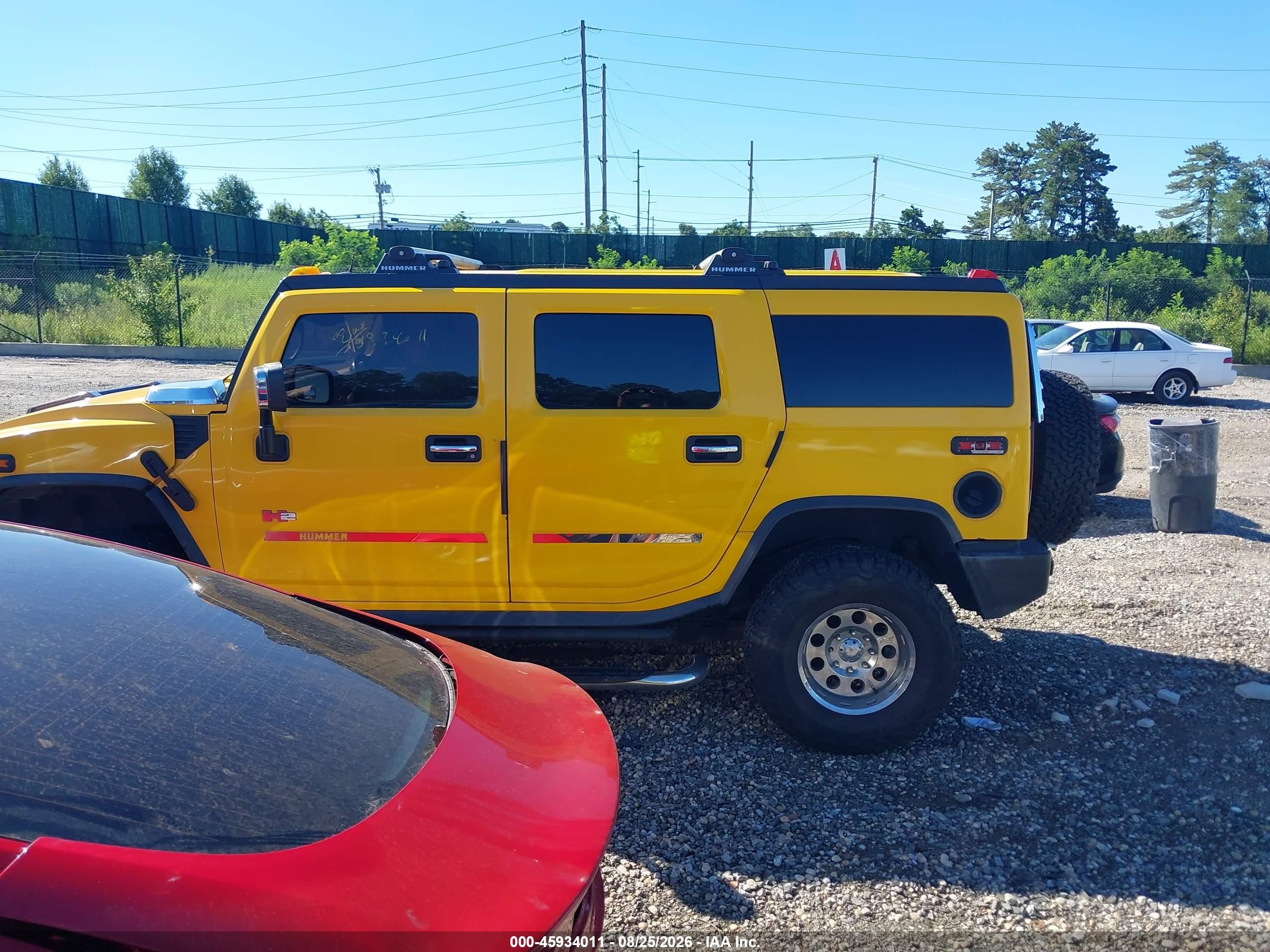 2003 Hummer H2   Yellow vin: 5GRGN23UX3H112187
