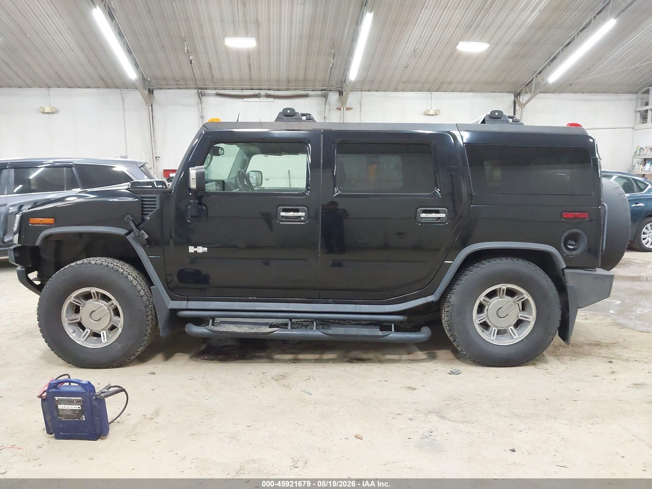 2003 Hummer H2   Black vin: 5GRGN23UX3H118121