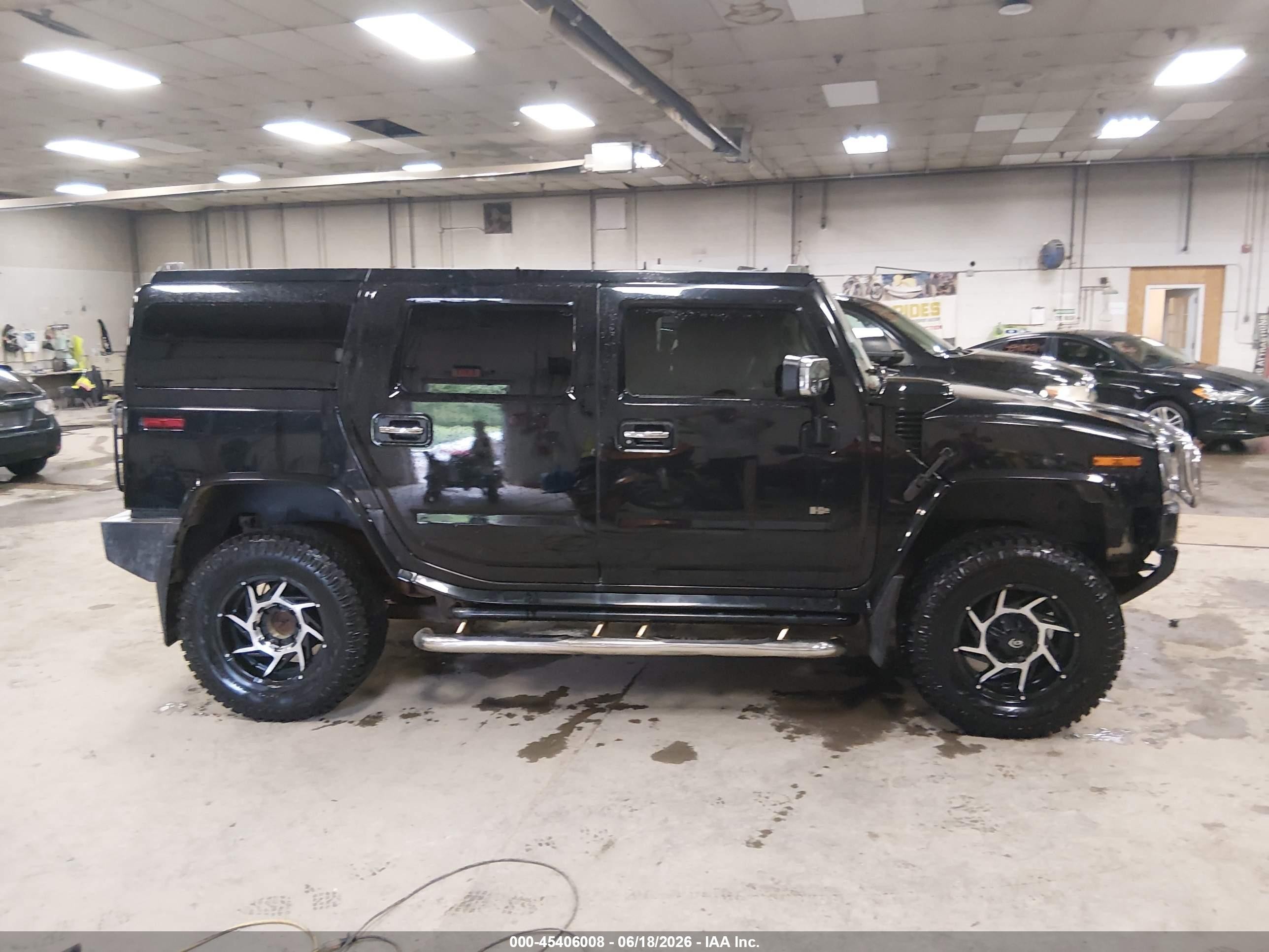 2003 Hummer H2   Black vin: 5GRGN23UX3H121875