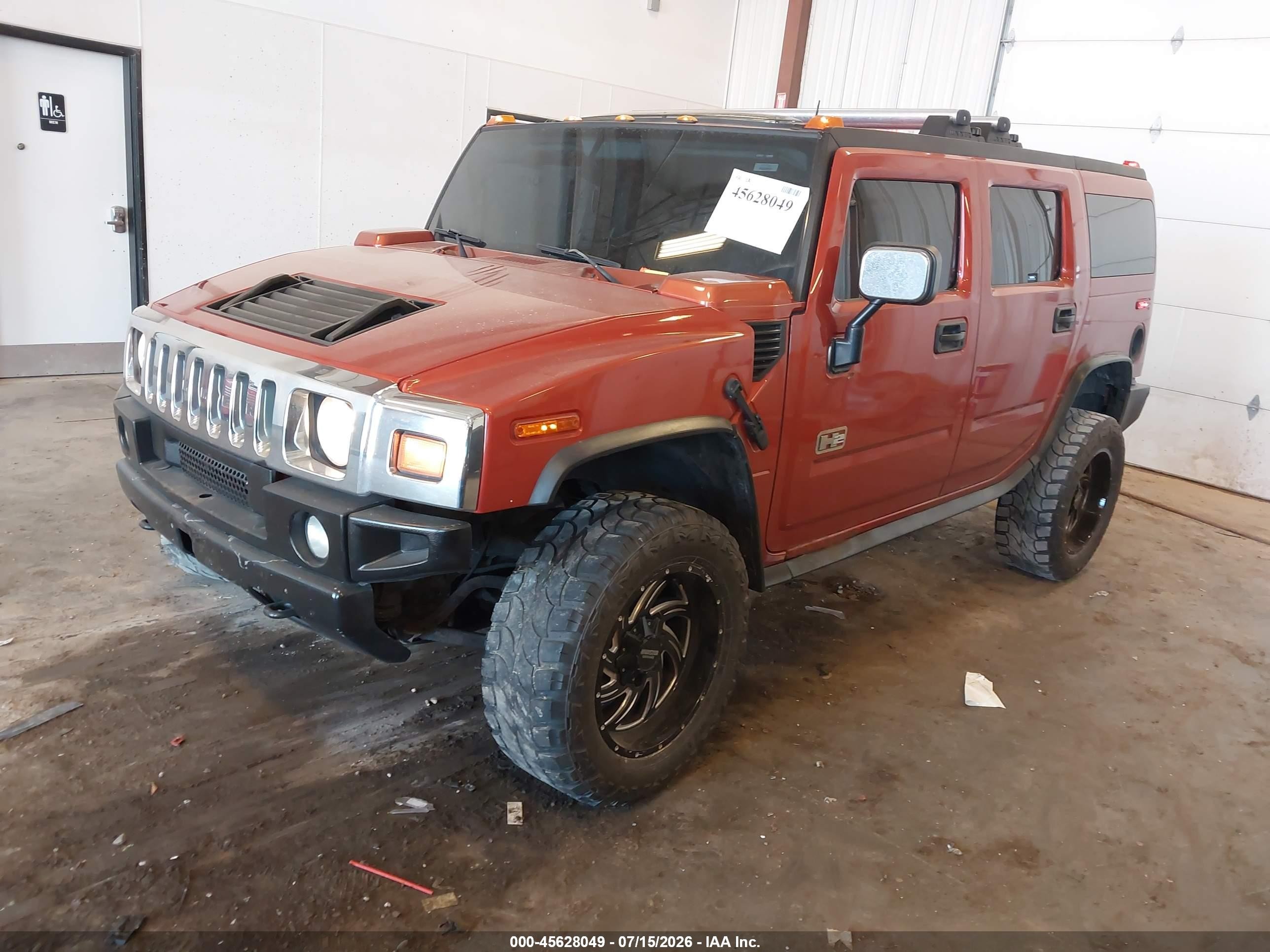 2003 Hummer H2   Orange vin: 5GRGN23UX3H147733