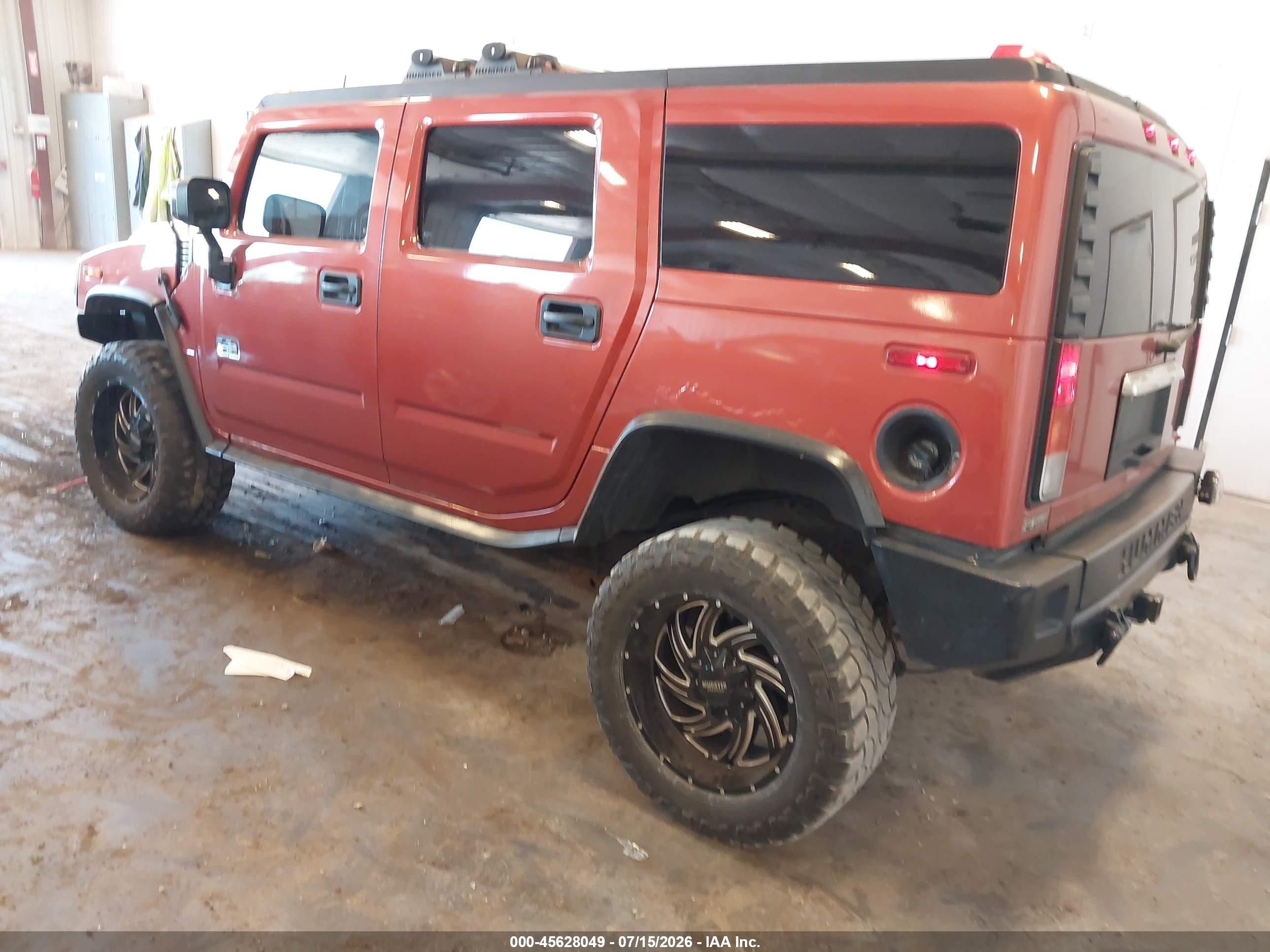 2003 Hummer H2   Orange vin: 5GRGN23UX3H147733