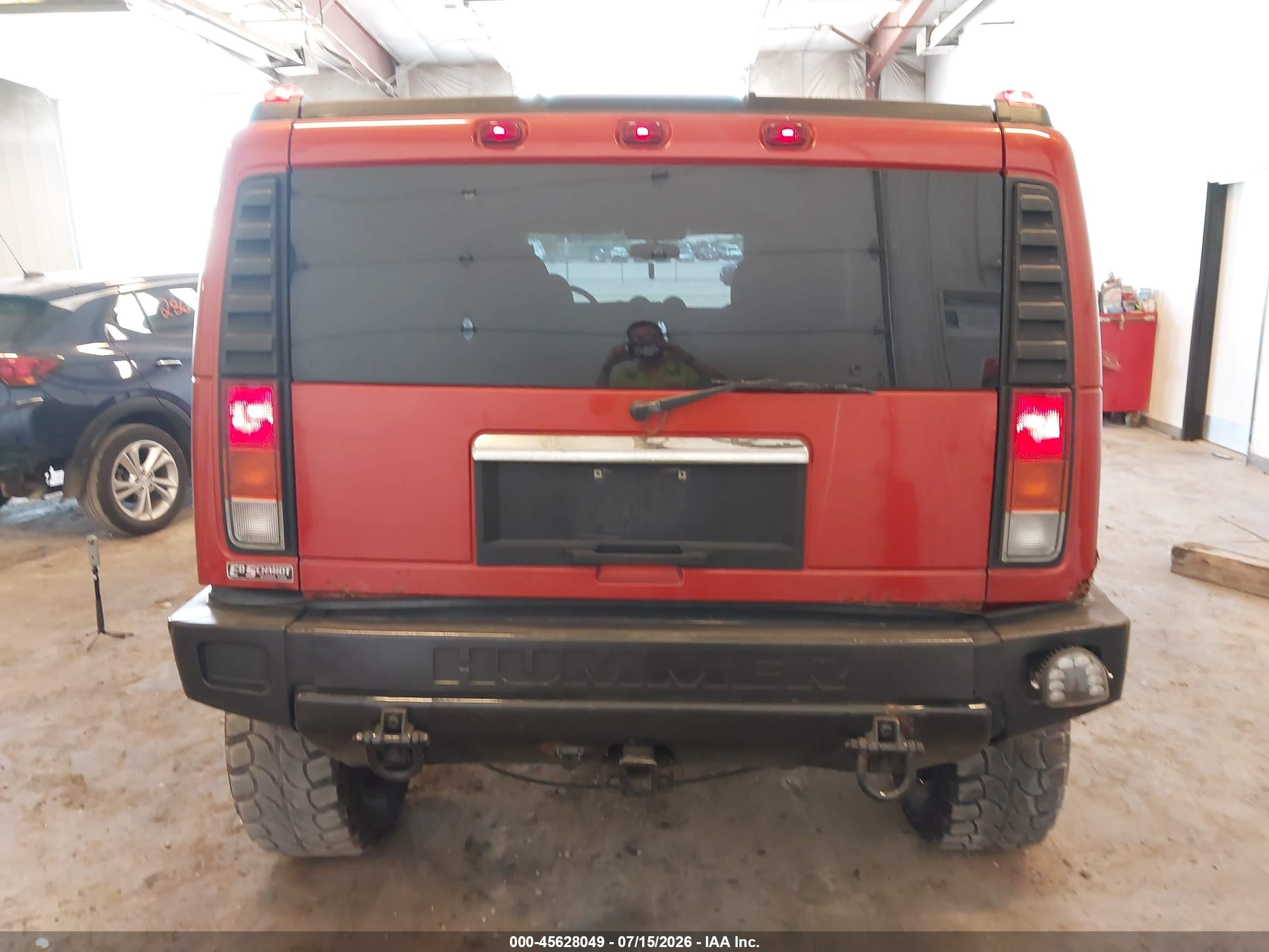 2003 Hummer H2   Orange vin: 5GRGN23UX3H147733