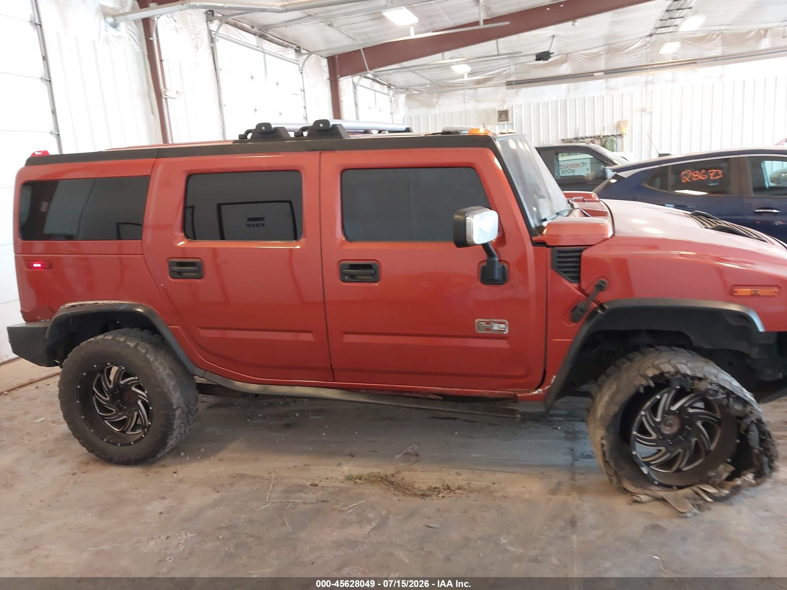 2003 Hummer H2   Orange vin: 5GRGN23UX3H147733