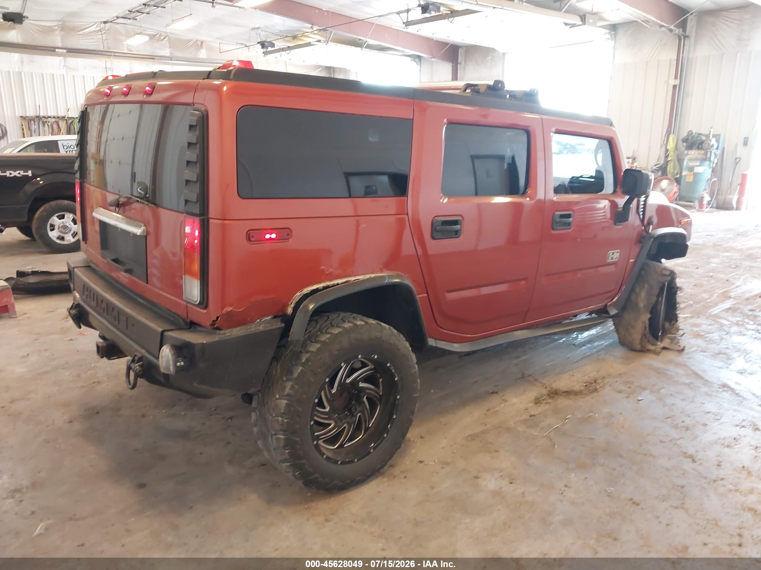 2003 Hummer H2   Orange vin: 5GRGN23UX3H147733