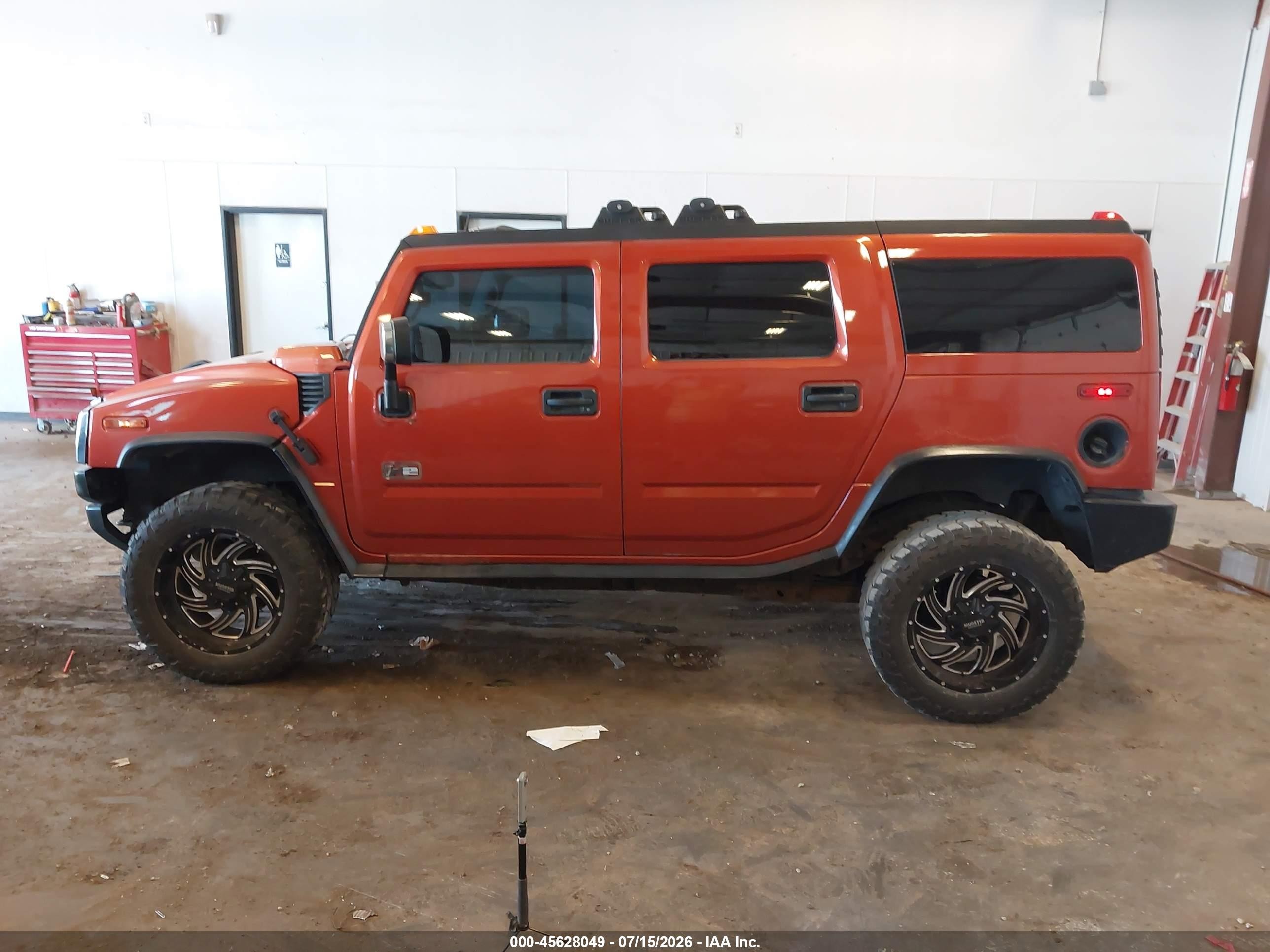 2003 Hummer H2   Orange vin: 5GRGN23UX3H147733