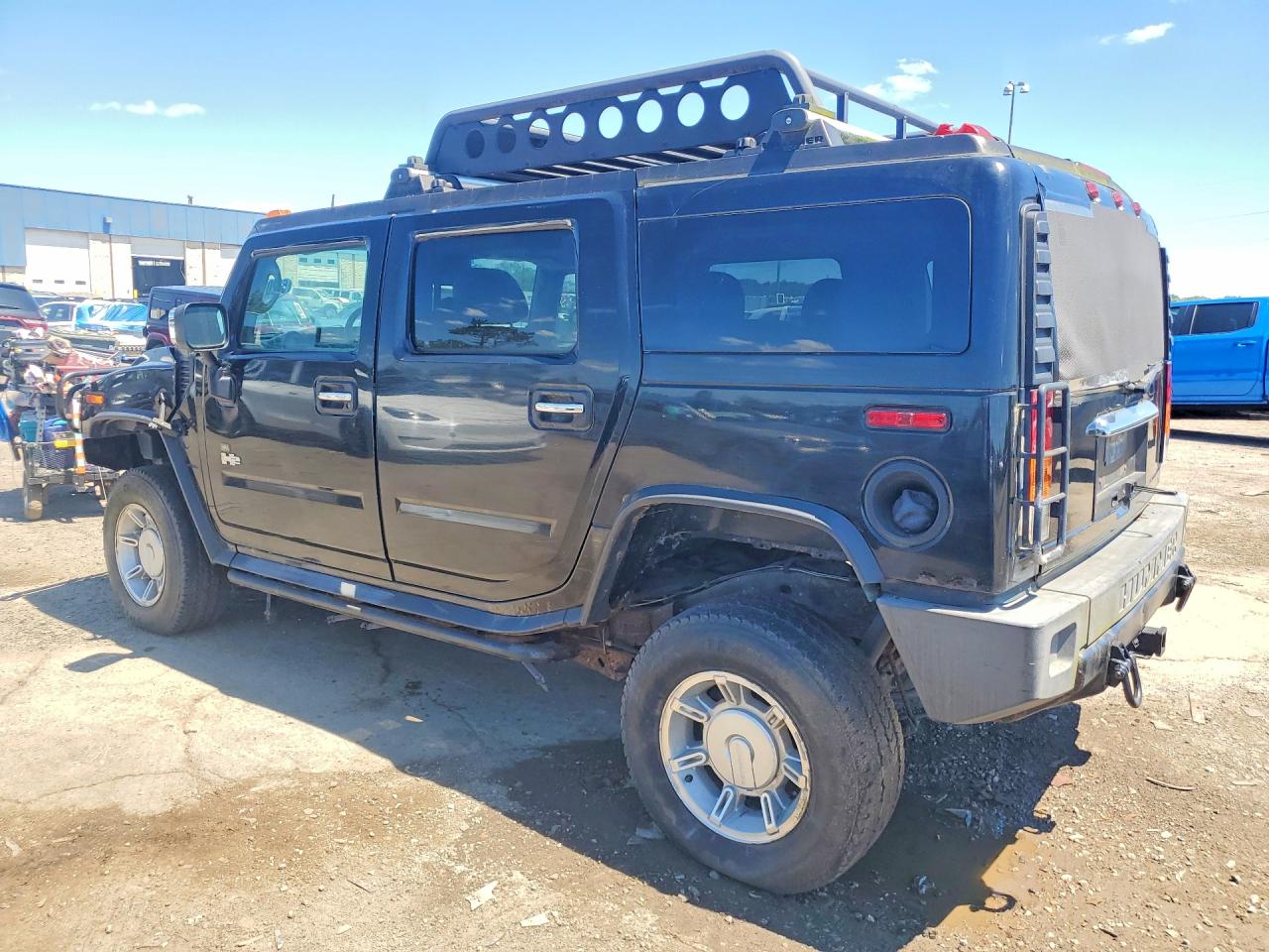 2004 Hummer H2 Black vin: 5GRGN23UX4H103393